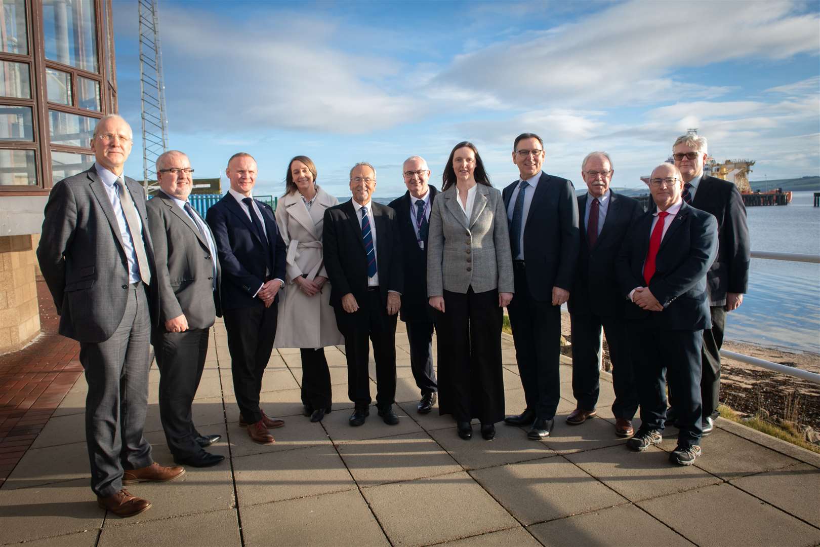 The public-private consortium Opportunity Cromarty Firth led by Joanne Allday (centre grey blazer), Roy MacGregor (fifth from left) and Bob Buskie (fourth from right). Picture: Callum Mackay.