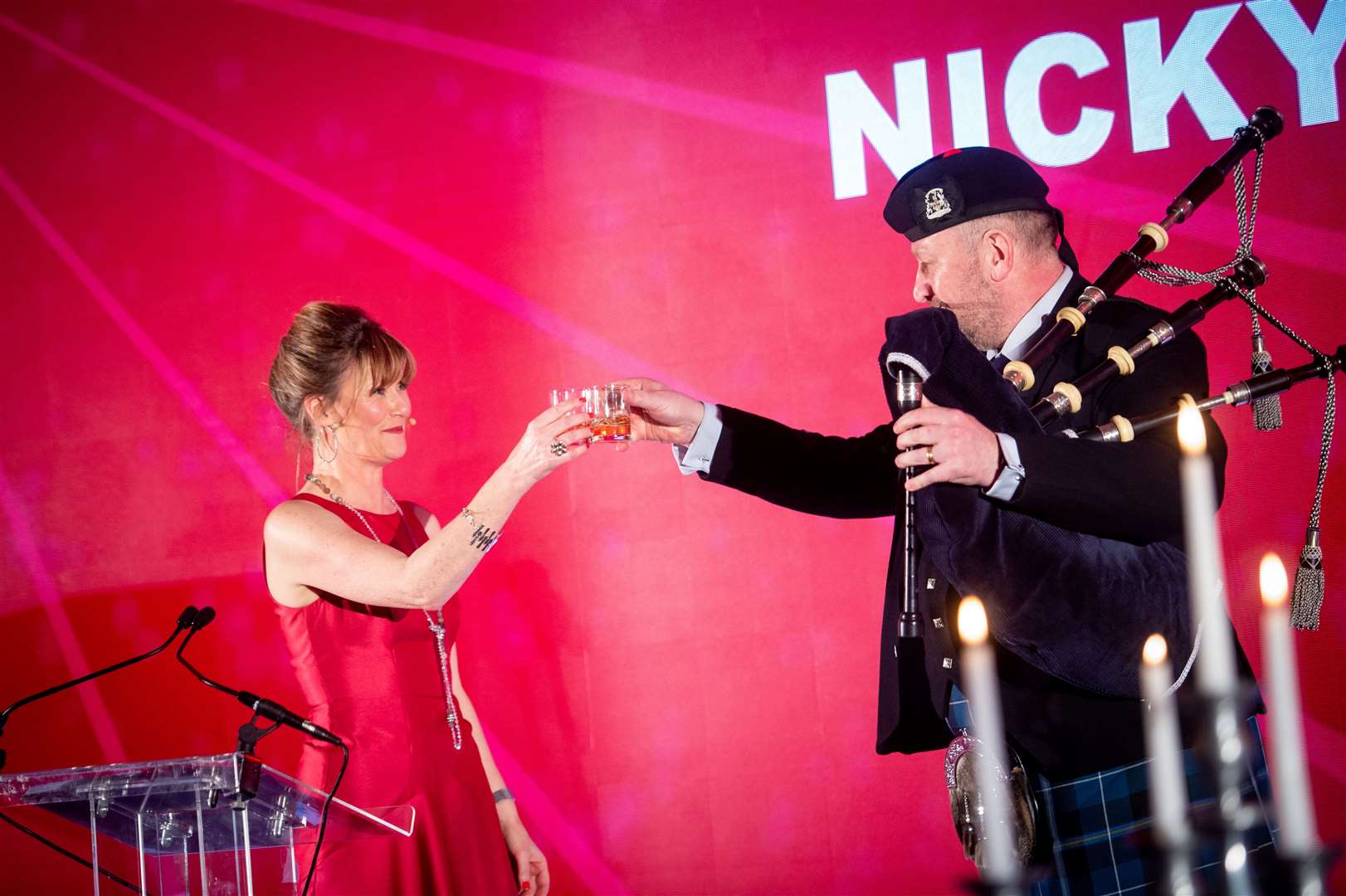 Nicky Marr with a toast to the piper who kicked the evening off. Picture: Callum Mackay