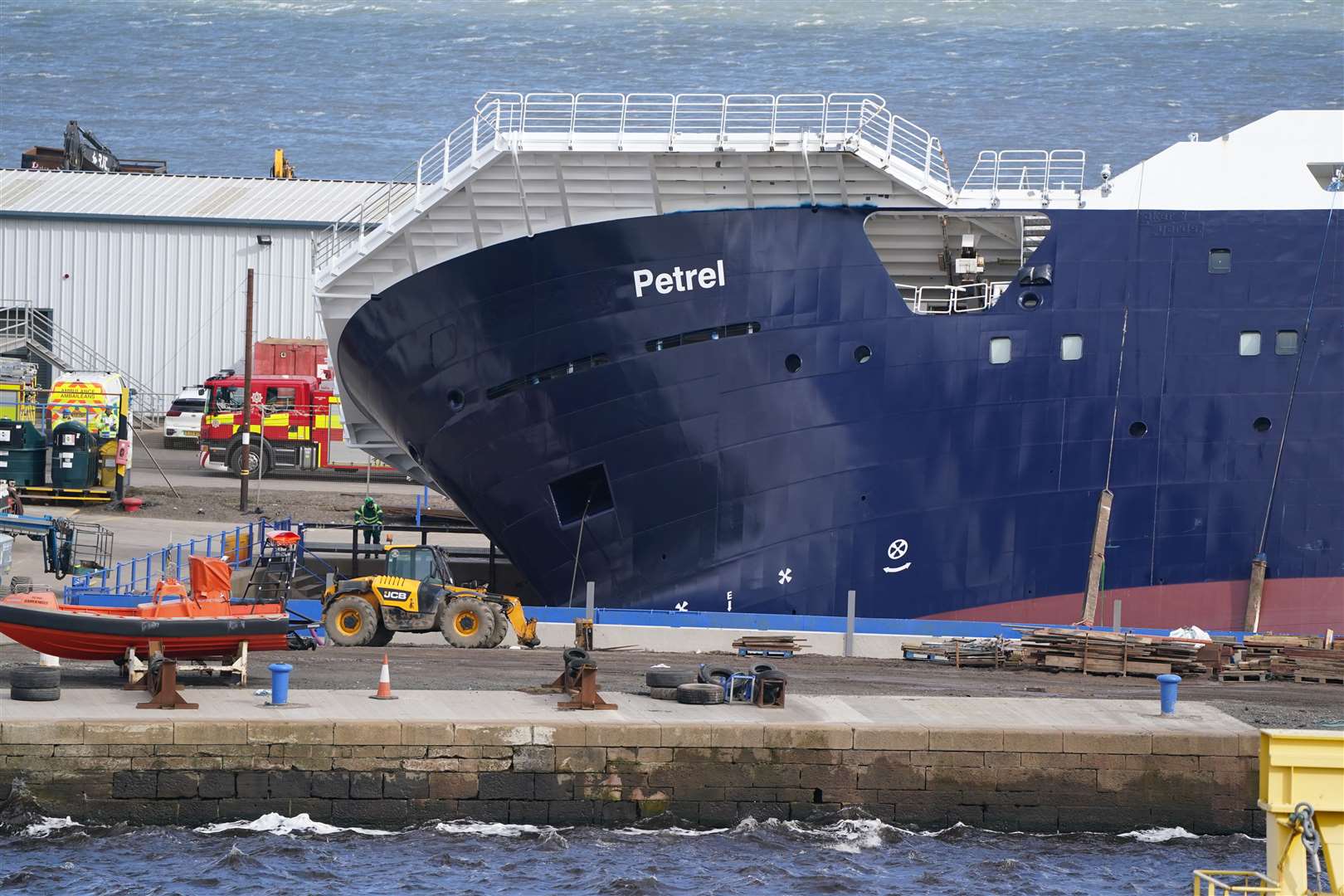 The vessel is leaning on its side following the incident at Imperial Dock in Leith (Andrew Milligan/PA)