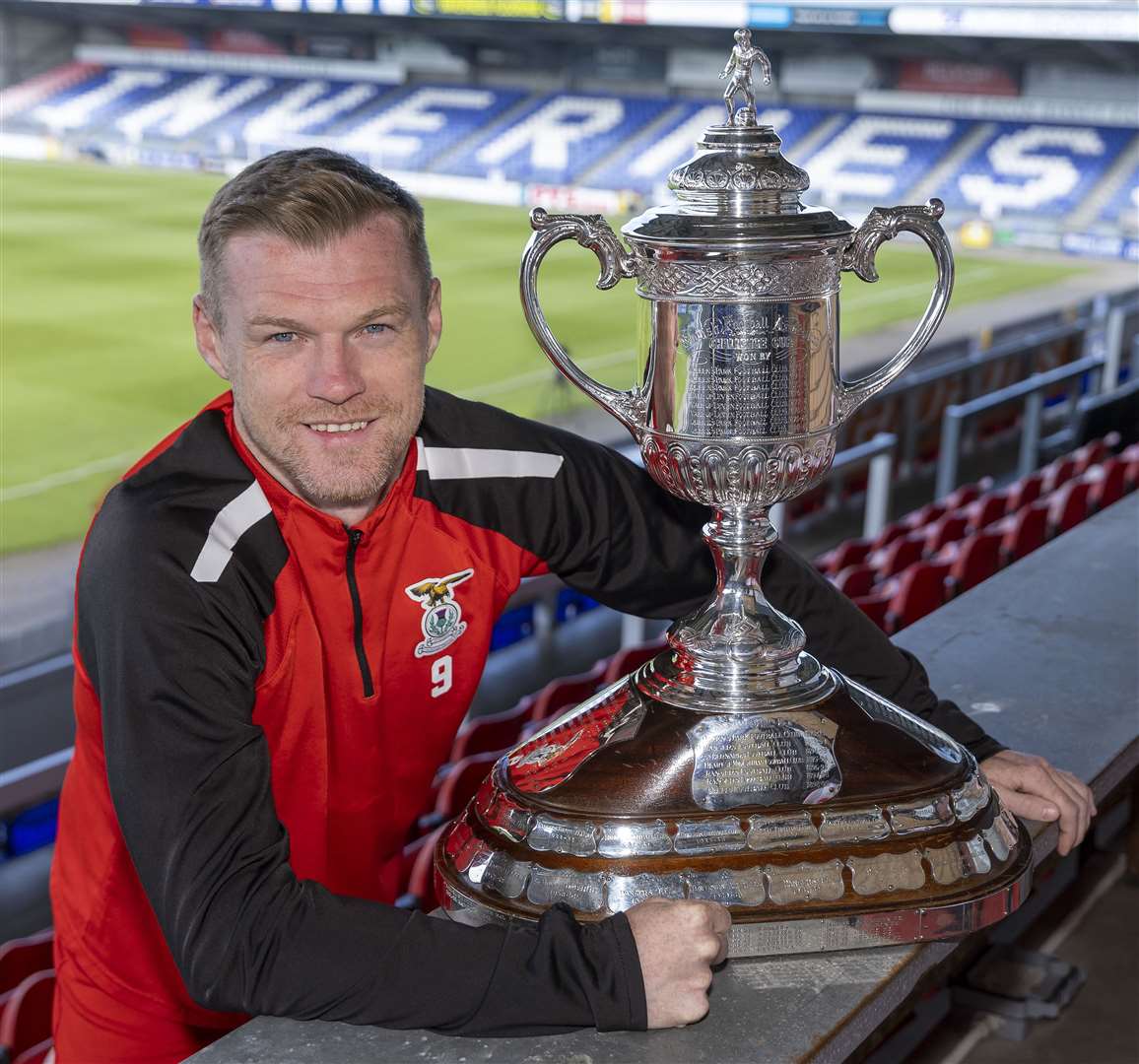 ICT’s Billy McKay gets to grips with the Scottish Cup silverware. Picture: Ken Macpherson.