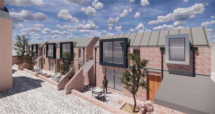 An artist's impression of the mews-style flats.