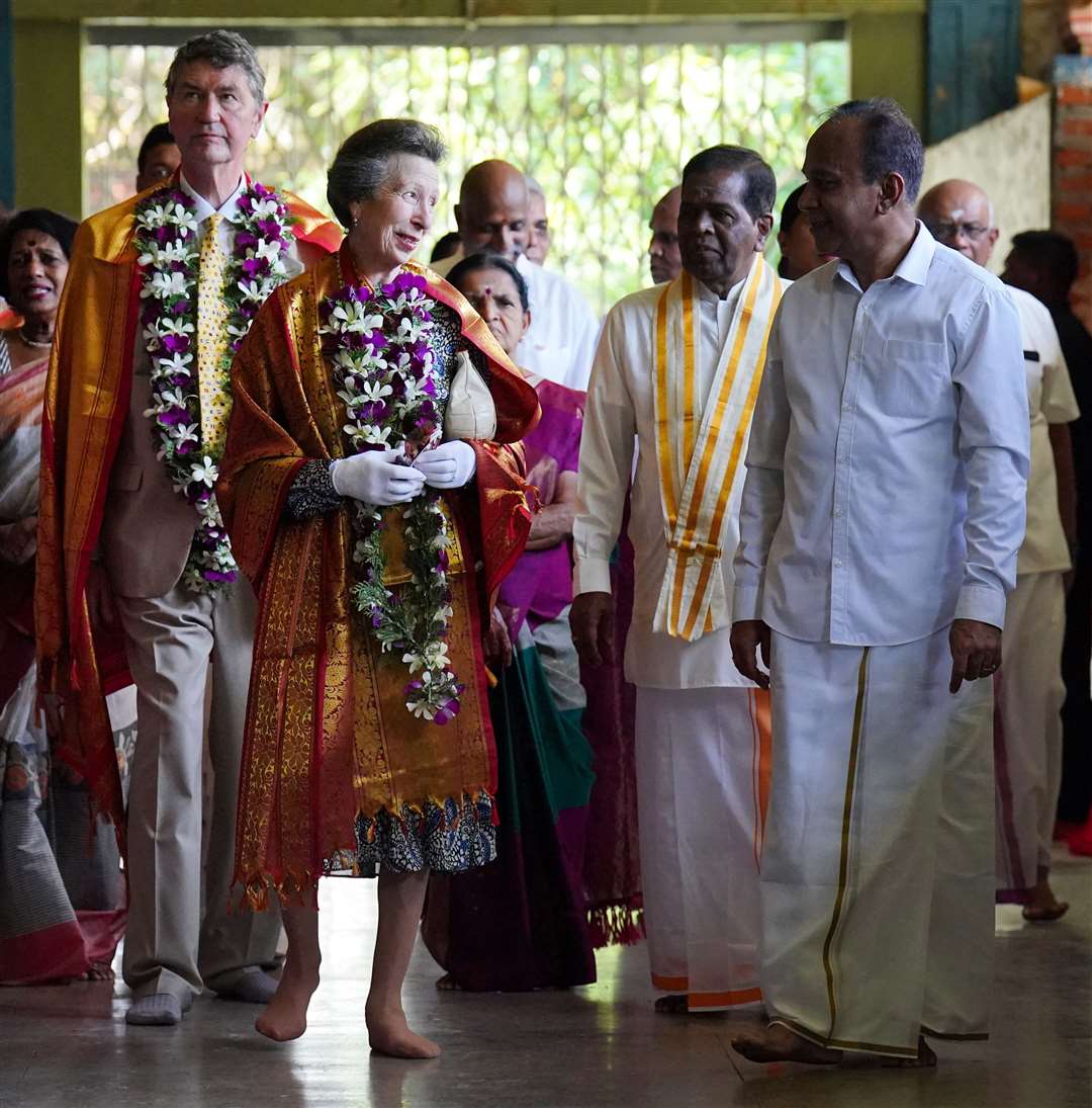The Princess Royal and her husband Vice Admiral Sir Tim Laurence visited Vajira Pillayar Kovil Hindu temple in Colombo (Jonathan Brady/PA)