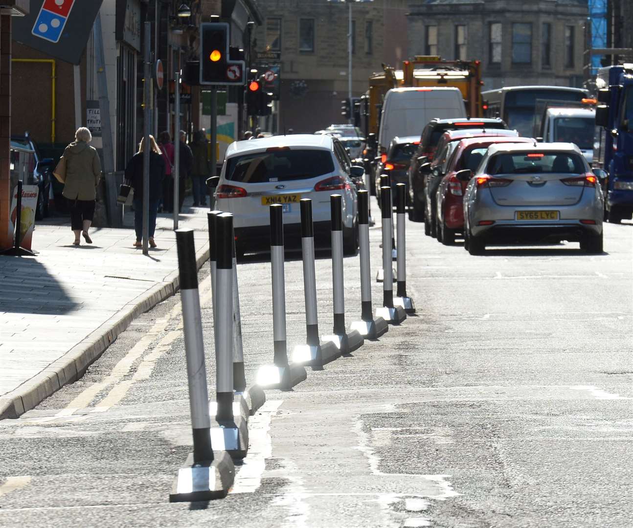 Spaces for People bollards and barriers that helped give rise to the proposed Academy Street changes. Picture Gary Anthony.