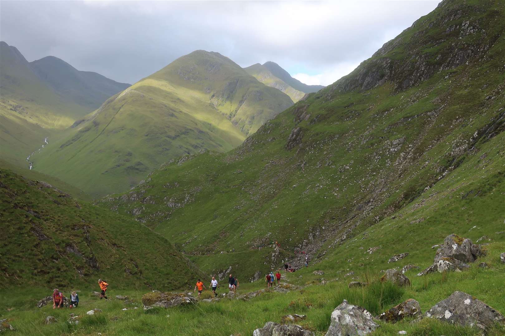 Looking back to the Five Sisters of Kintail ridge from above the waterfall section.
