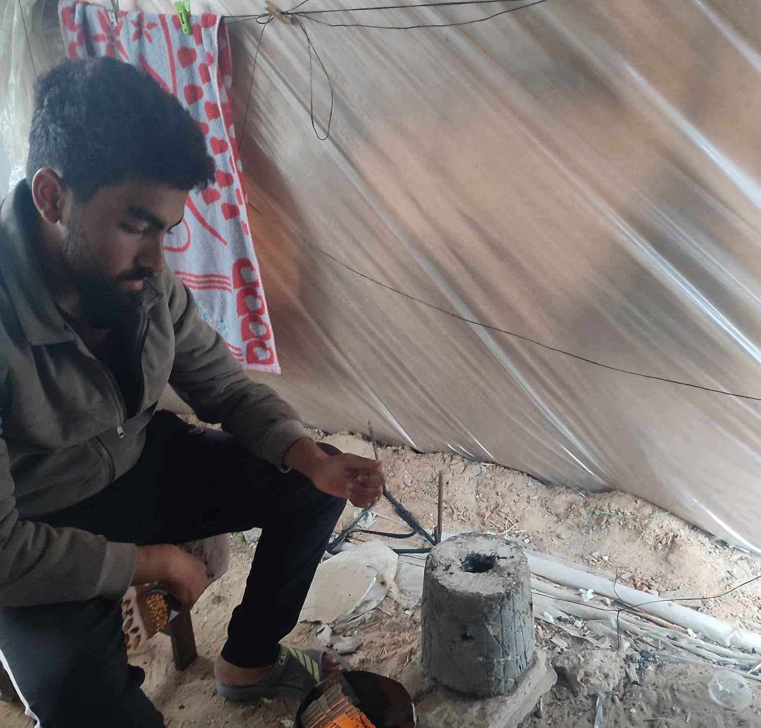 Salim Ghayyda's family have been forced to live as refugees in makeshift tents.