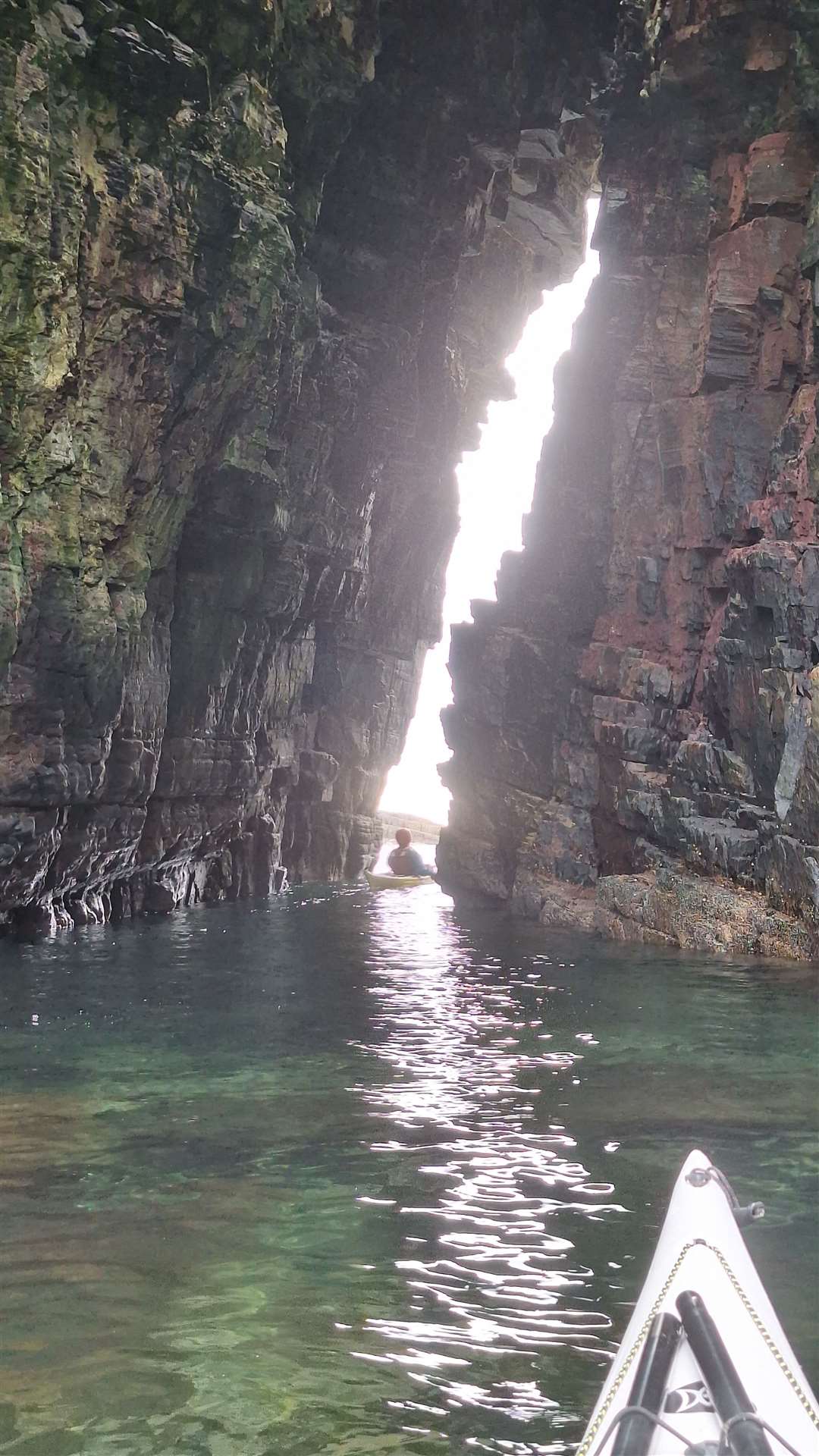 A narrow cleft through the cliffs.