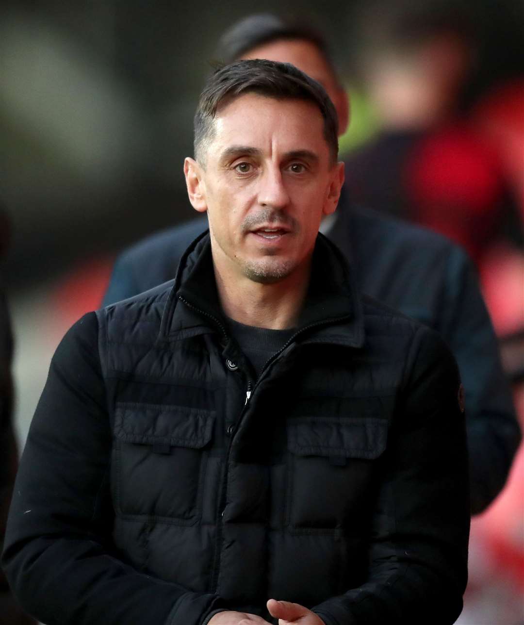 Gary Neville wants workforce to return to Manchester city centre (Martin Rickett/PA)
