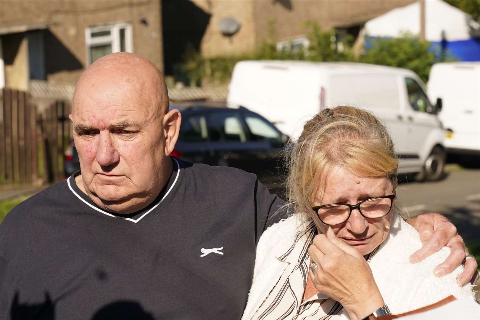 Debbie and Trevor Bennett, the grandparents of two of the victims, speaking to the media at the scene (Danny Lawson/PA)