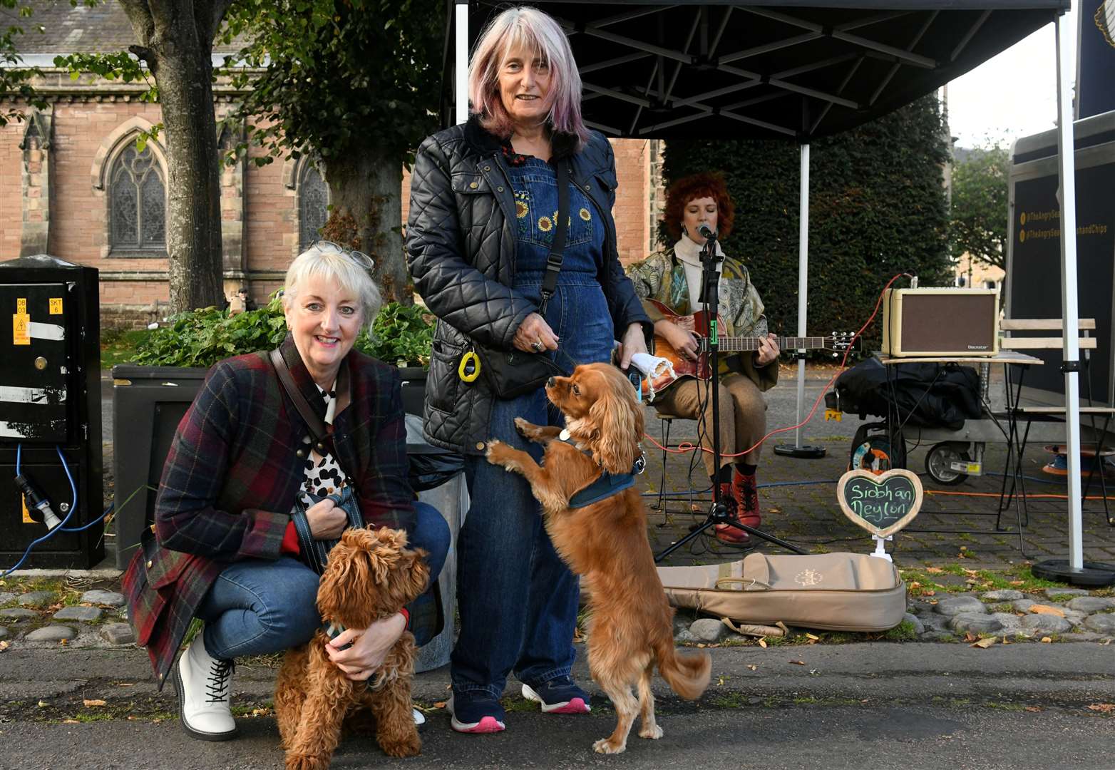 Tracey Griffin and Mariah Dickson with Teddy the cavapoo and Rudy the King Charles Spaniel. Picture: James Mackenzie.