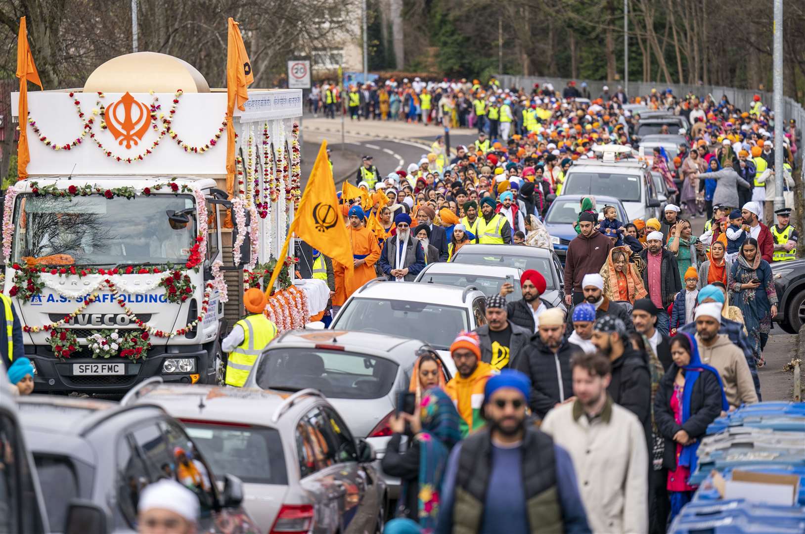 People taking part in the annual procession in Glasgow as part of the Sikh Vaisakhi celebration to celebrate the Birth of the Sikh Nation (Jane Barlow/PA)