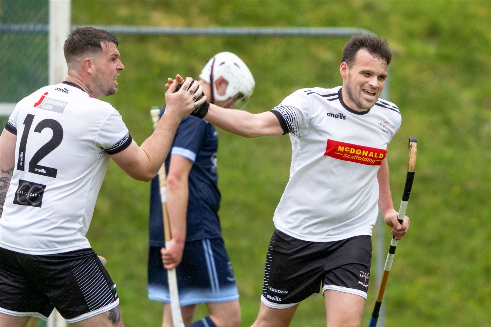 Lovat's Greg Matheson (right) gets the first of his goals. Skye Camanachd v Lovat in the Mowi Premiership, played at Pairc Nan Laoch, Portree.