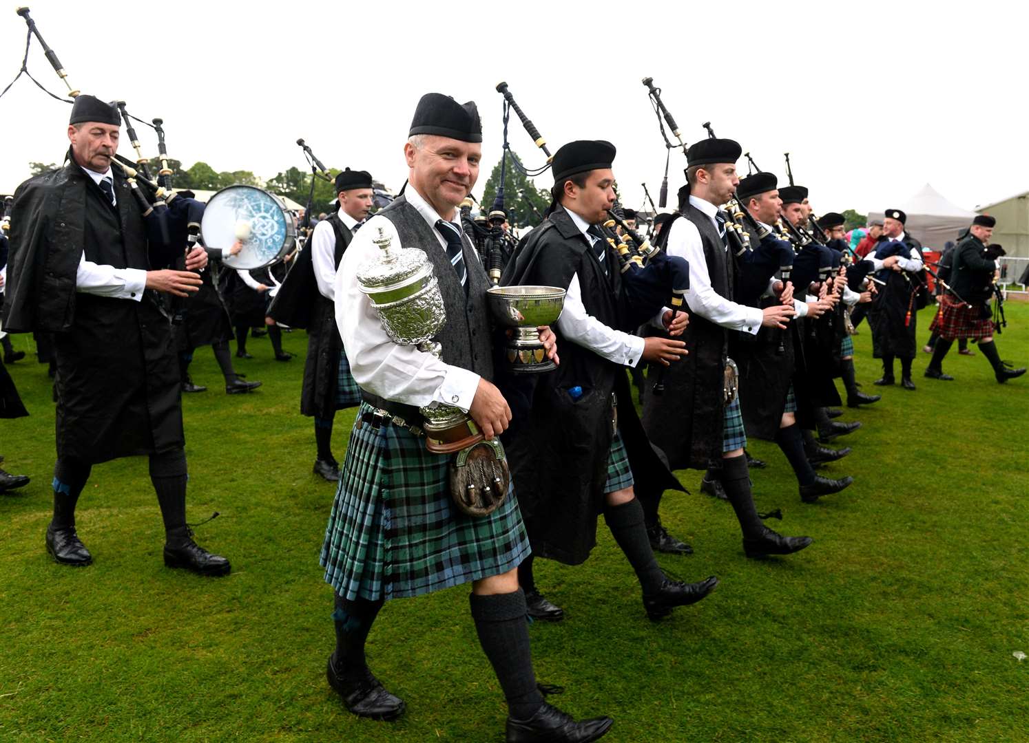 Pipe Major Stuart Liddle of Inveraray and District Pipe Band winners of the grade 1 trophy 2019 as they leave the arena. Picture: Alasdair Allen