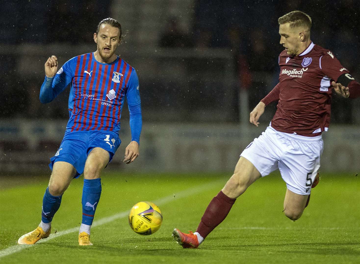 Walsh evades Arbroath’s Thomas O’Brien to deliver a cross on Tuesday. Picture: Ken Macpherson