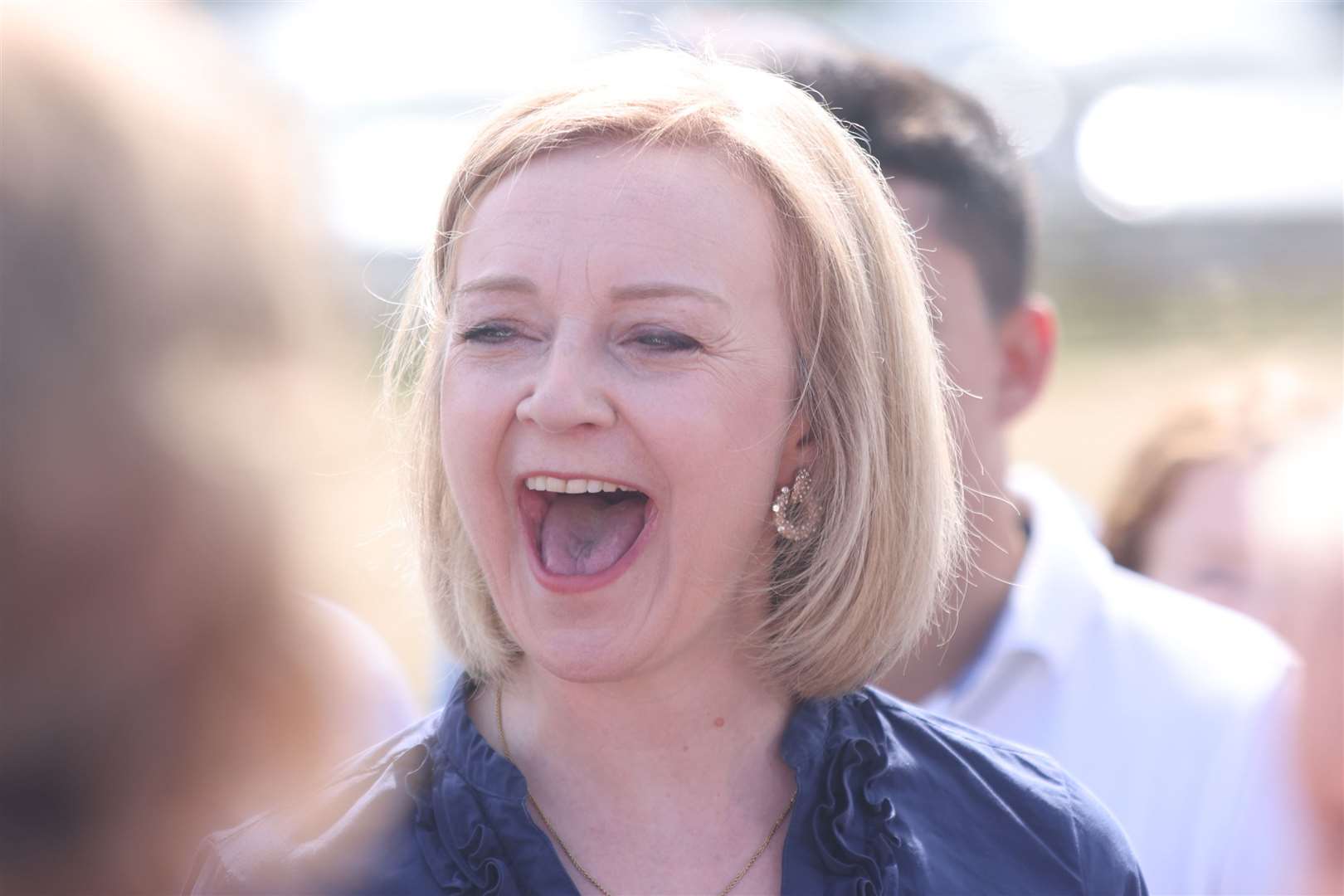 Liz Truss speaks to supporters during a visit to Ashley House, Marden, Kent, as part of her campaign (James Manning/PA)