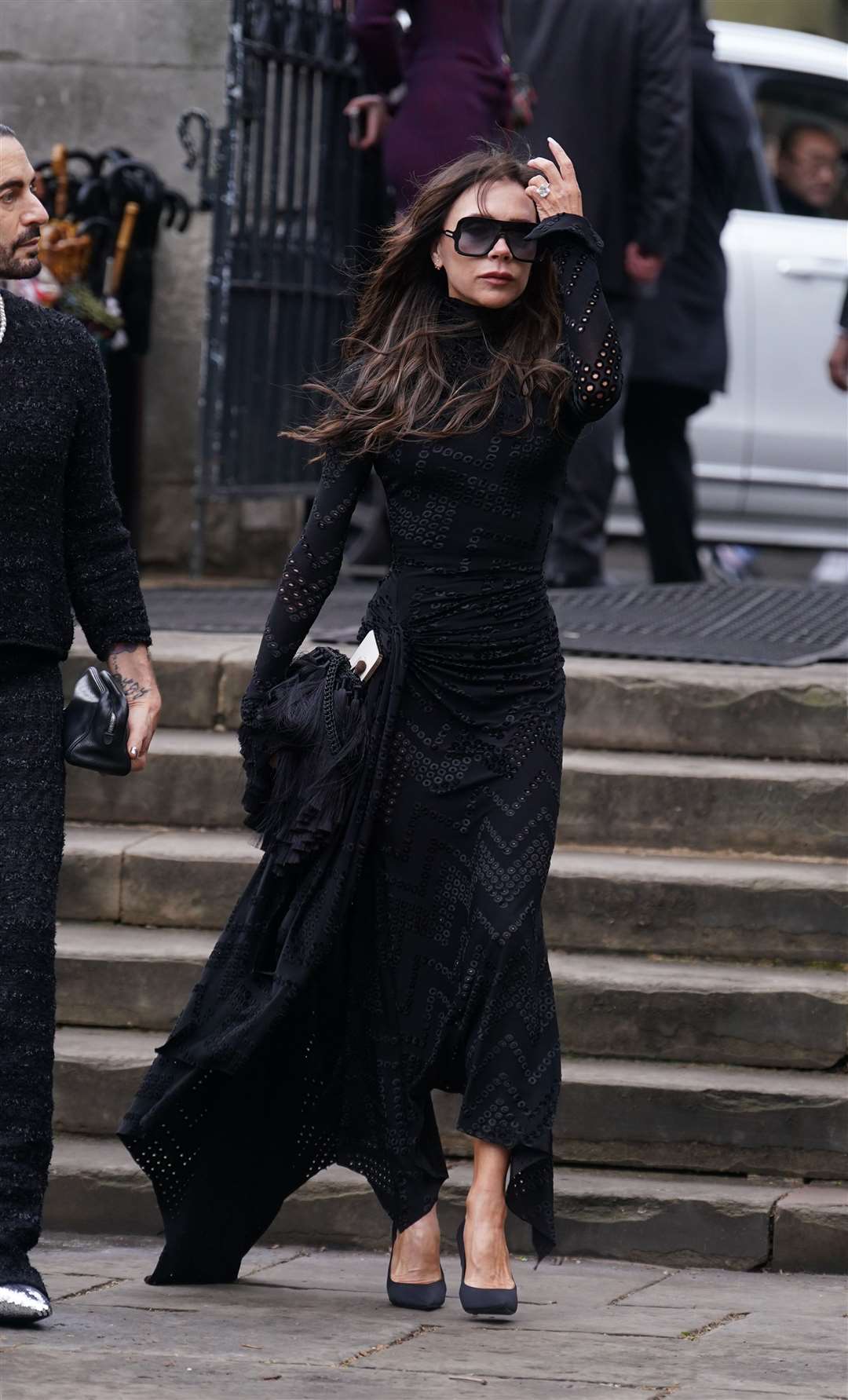 Victoria Beckham wore a skintight black dress for the memorial service (Yui Mok/PA)