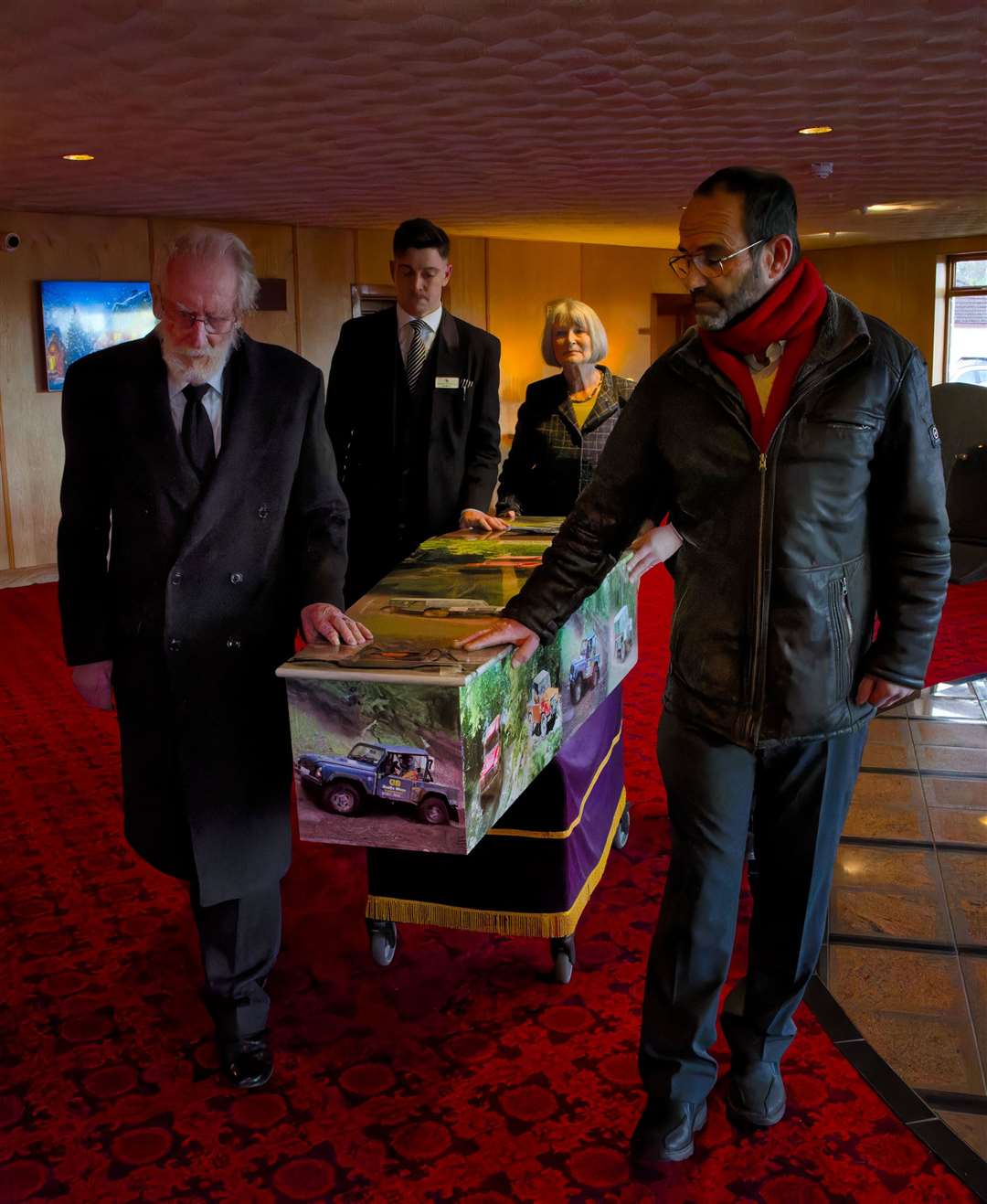 Eddie's coffin was adorned with images of Land Rovers off-roading in tribute to his love of the vehicles and his role as founder of the Highland 4 Wheel Drive Club. Picture: Nick Sidle.