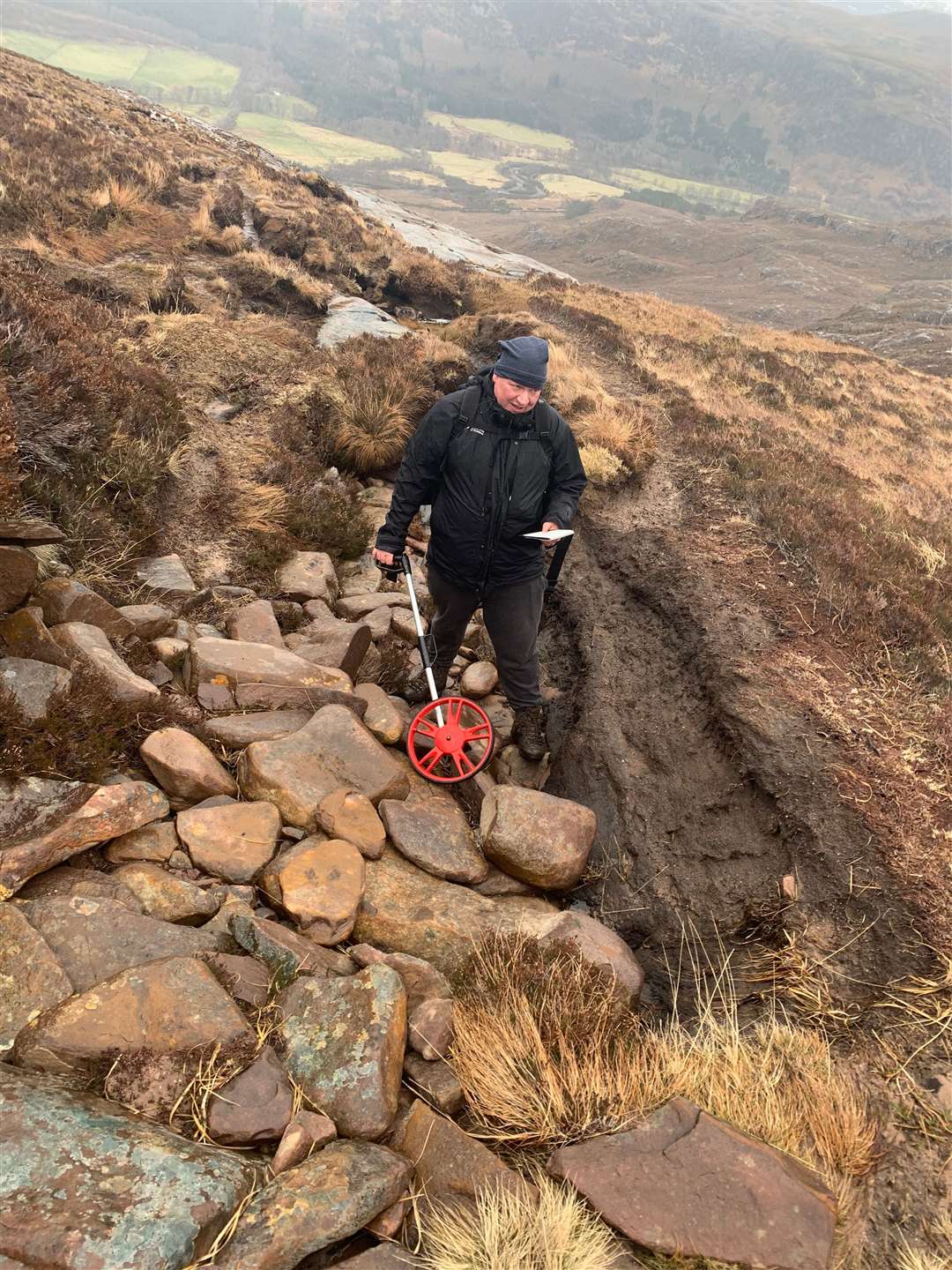 OATS chief executive Dougie Baird carrying out a path survey on An Teallach. Picture: OATS