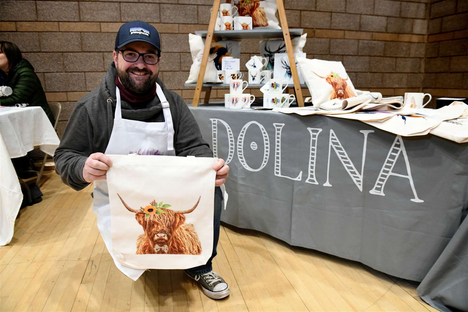 Spring Craft Fair in Inverness Leisure Centre: Robert Day from Drumnadrochit selling his partner's art at the Dolina stall. Picture: James Mackenzie.