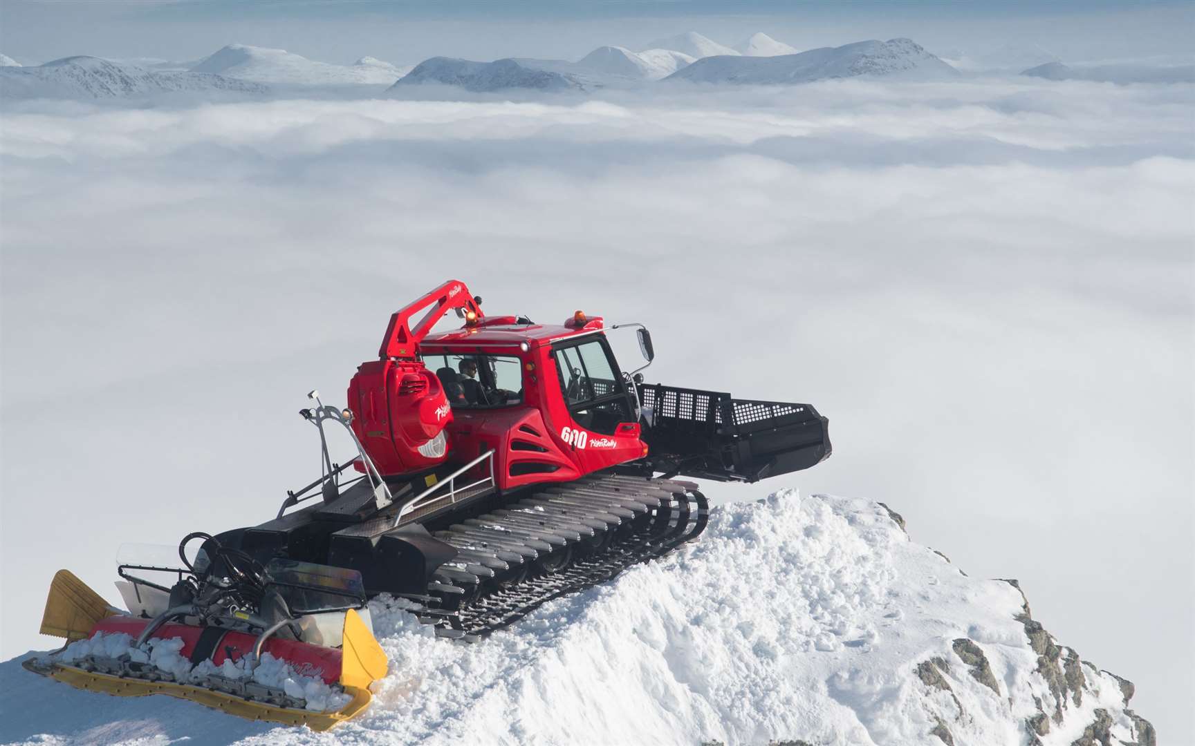 Skiing with a view – a piste-beater parked at the top of Glencoe Mountain Resort. Picture: Steve McKenna