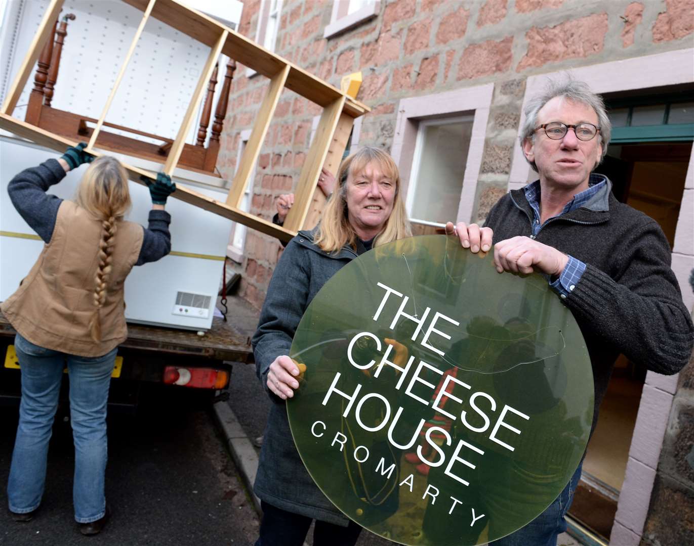 The Cheese House in Cromarty moves premises with help from the community back in 2015.Owners Jon and Emmy Palmer took the sign with them. Picture: Gary Anthony.
