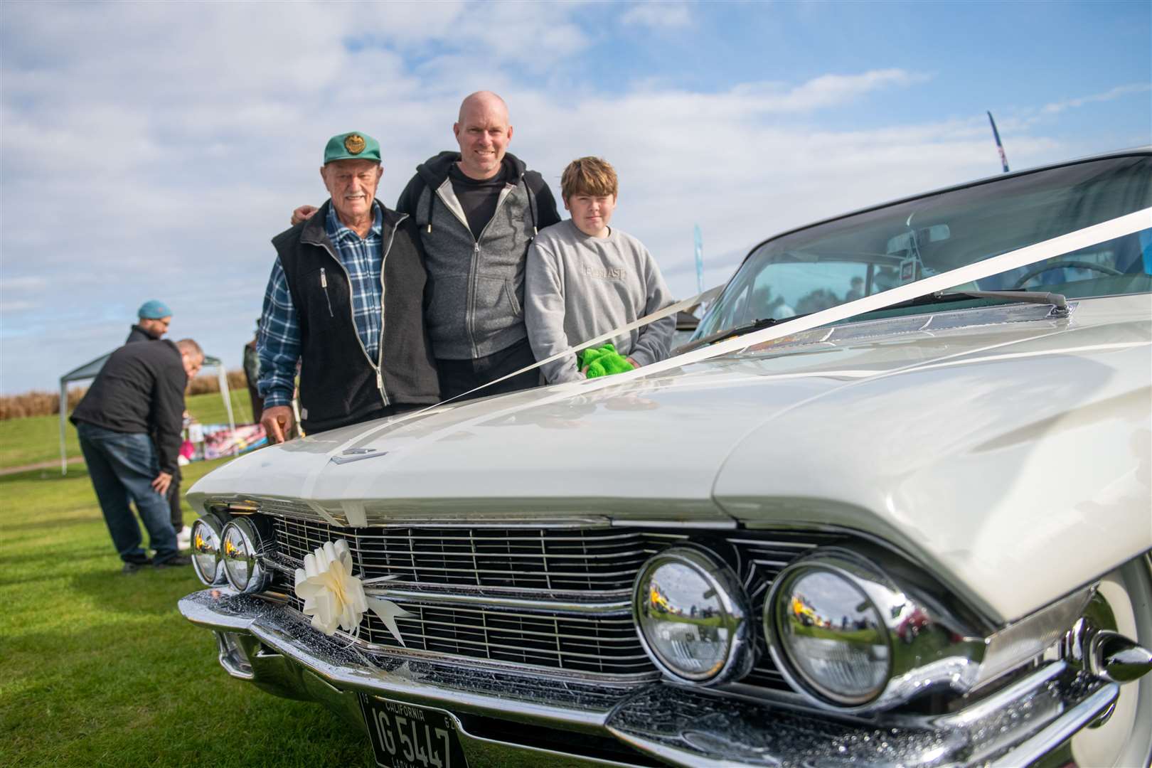 Dennis Gearing, Dean and Mathew White with their cadillac the lady Margaret in memory of the late wife of Dennis. Picture: Callum Mackay..