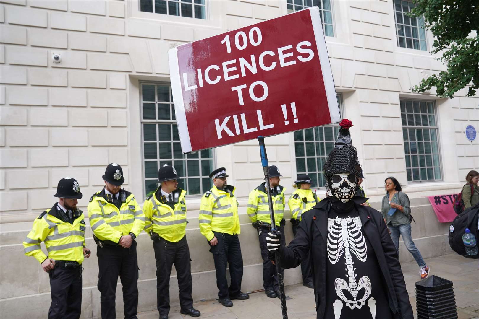 One protester in central London was dressed as a skeleton (Lucy North/PA)