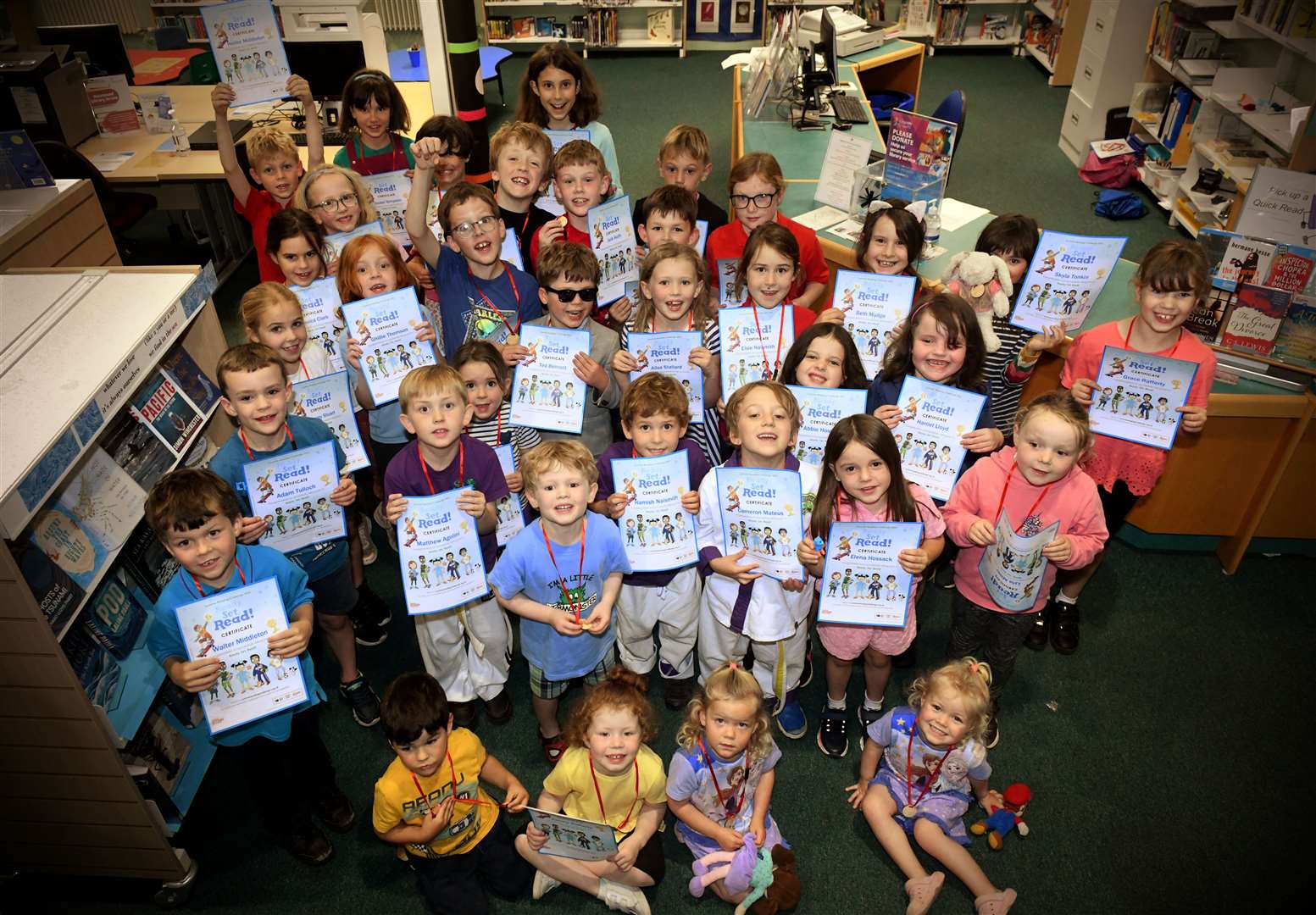 The children received medals and certificates for completing the Fortrose Library Summer reading challenge. Picture: James Mackenzie.