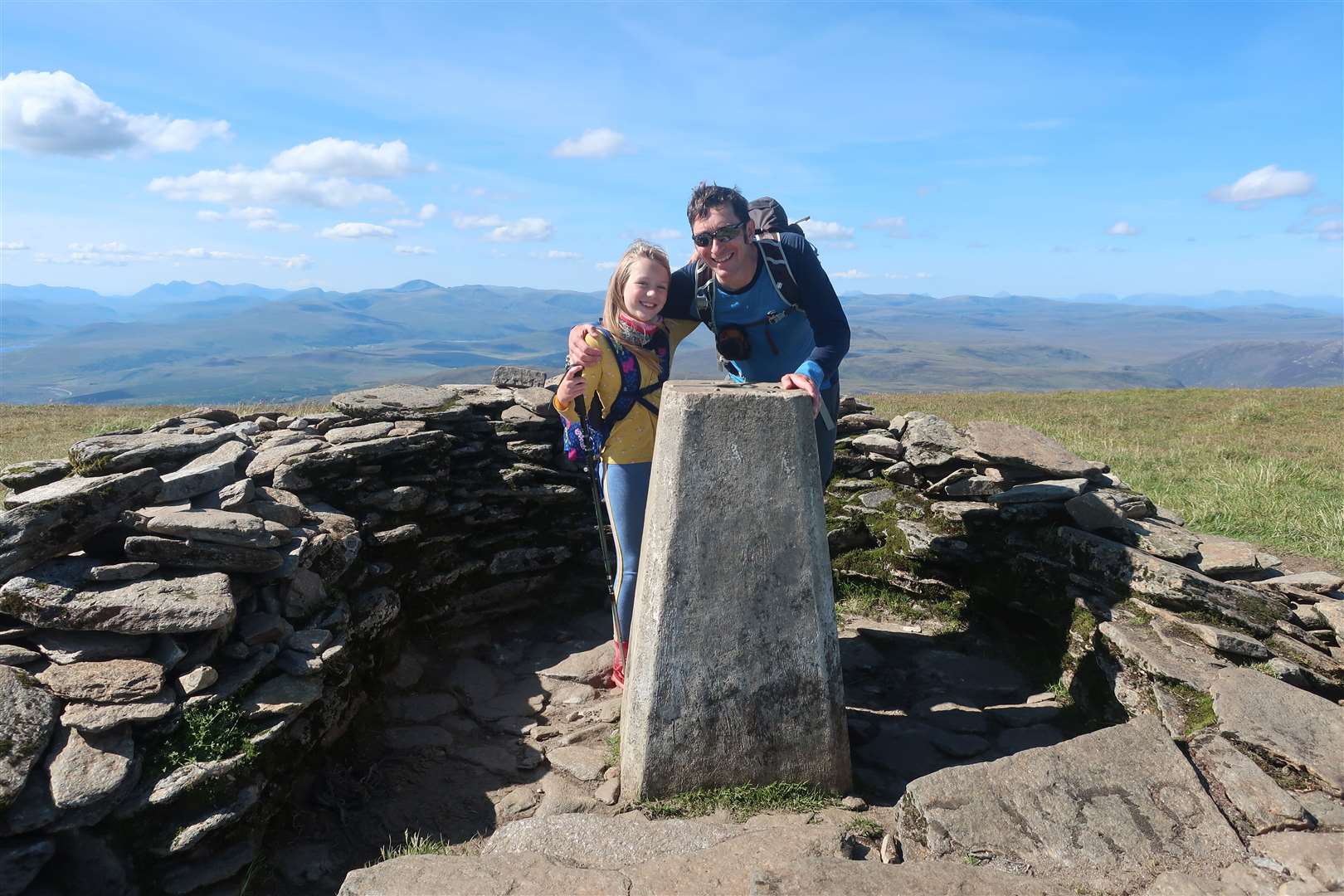 Clara with John at the summit of Ben Wyvis, her first Munro.