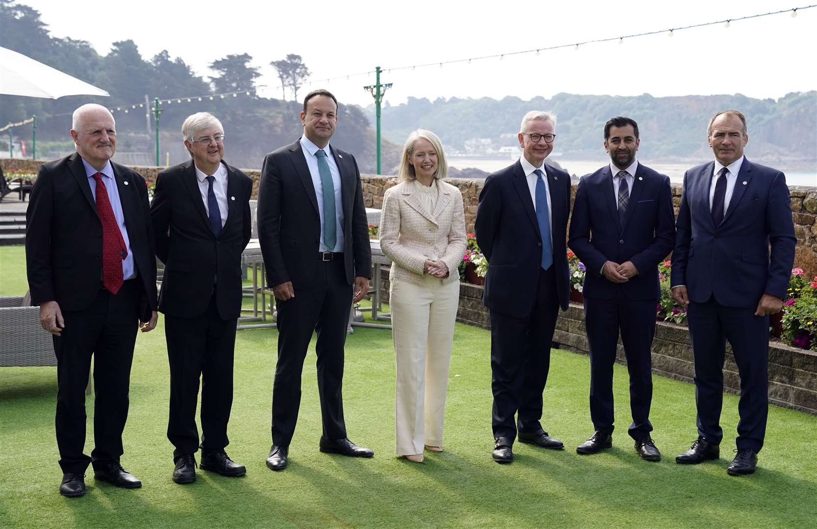 Chief Minister of Guernsey Peter Ferbrache, First Minister of Wales Mark Drakeford, Taoiseach Leo Varadkar, Chief Minister of Jersey Kristina Moore, UK Cabinet minister Michael Gove, First Minister of Scotland Humza Yousaf and Chief Minister of the Isle of Man Alfred Cannon at the British-Irish Council summit meeting at the L’Horizon Hotel in St Brelade’s Bay, Jersey. (Andy Matthews/PA)
