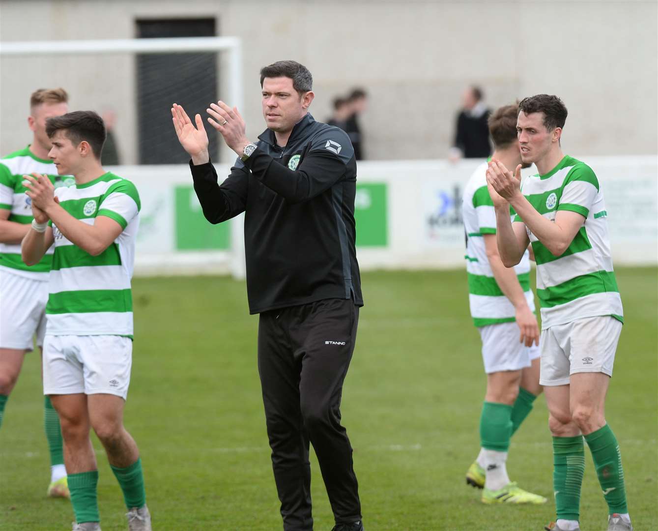 Disappointment for Buckie at final whistle as players and manager Graeme Stewart applaud the fans. Picture Gary Anthony.