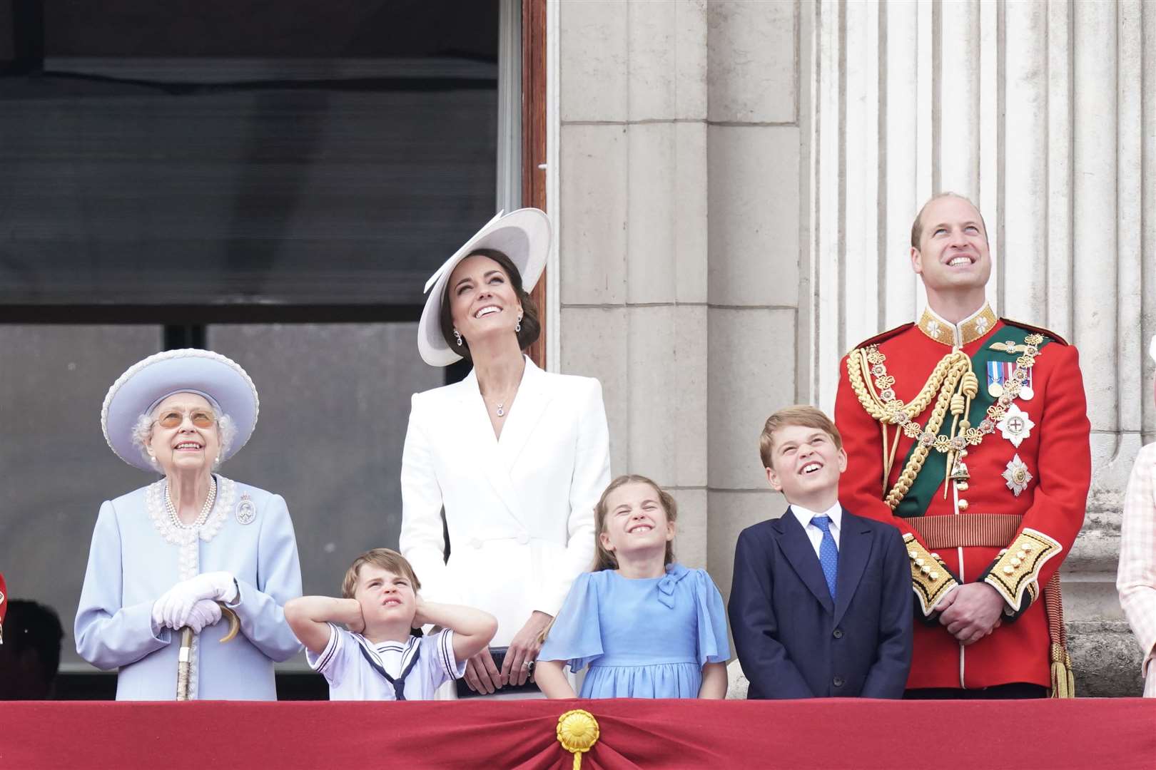 The Queen, Prince Louis, the Duchess of Cambridge, Princess Charlotte, Prince George and the Duke of Cambridge on the balcony of Buckingham Palace (Aaron Chown/PA)