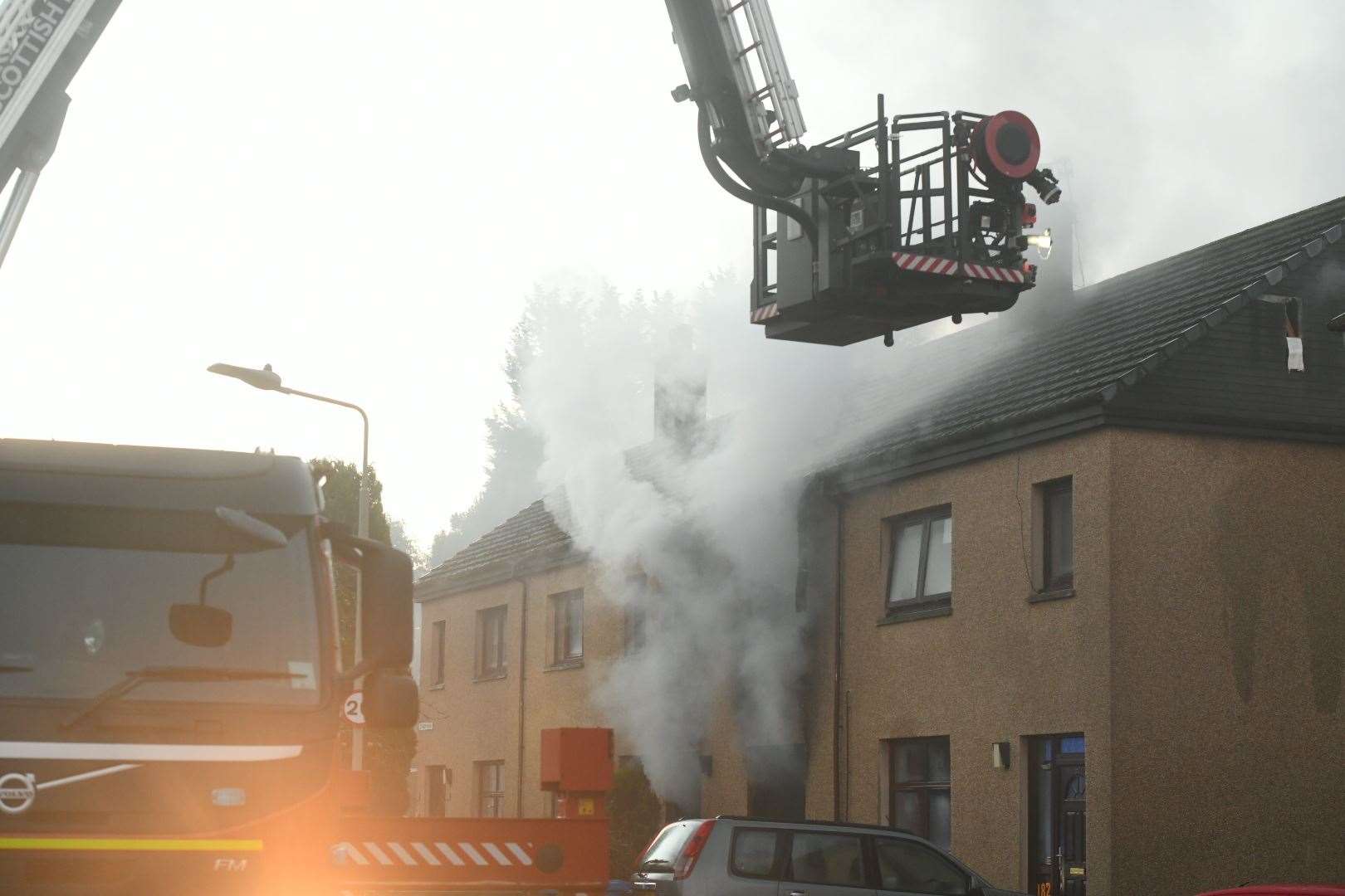 Firefighters tackle the blaze at the property in St Valery Avenue, Dalneigh.