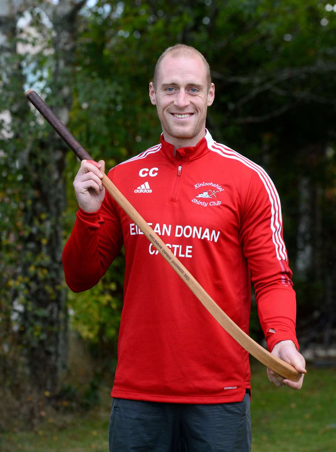 Conor Cormack with the commemorative caman. Picture: Gary Anthony
