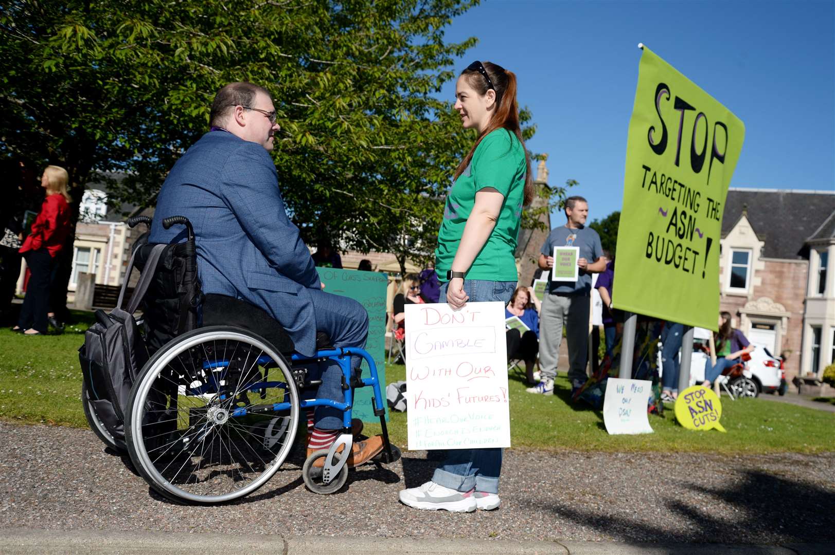 Carrie Watt speaks to Councillor Andrew Jarvie at demonstration at Highland Council calling for support for ASN.