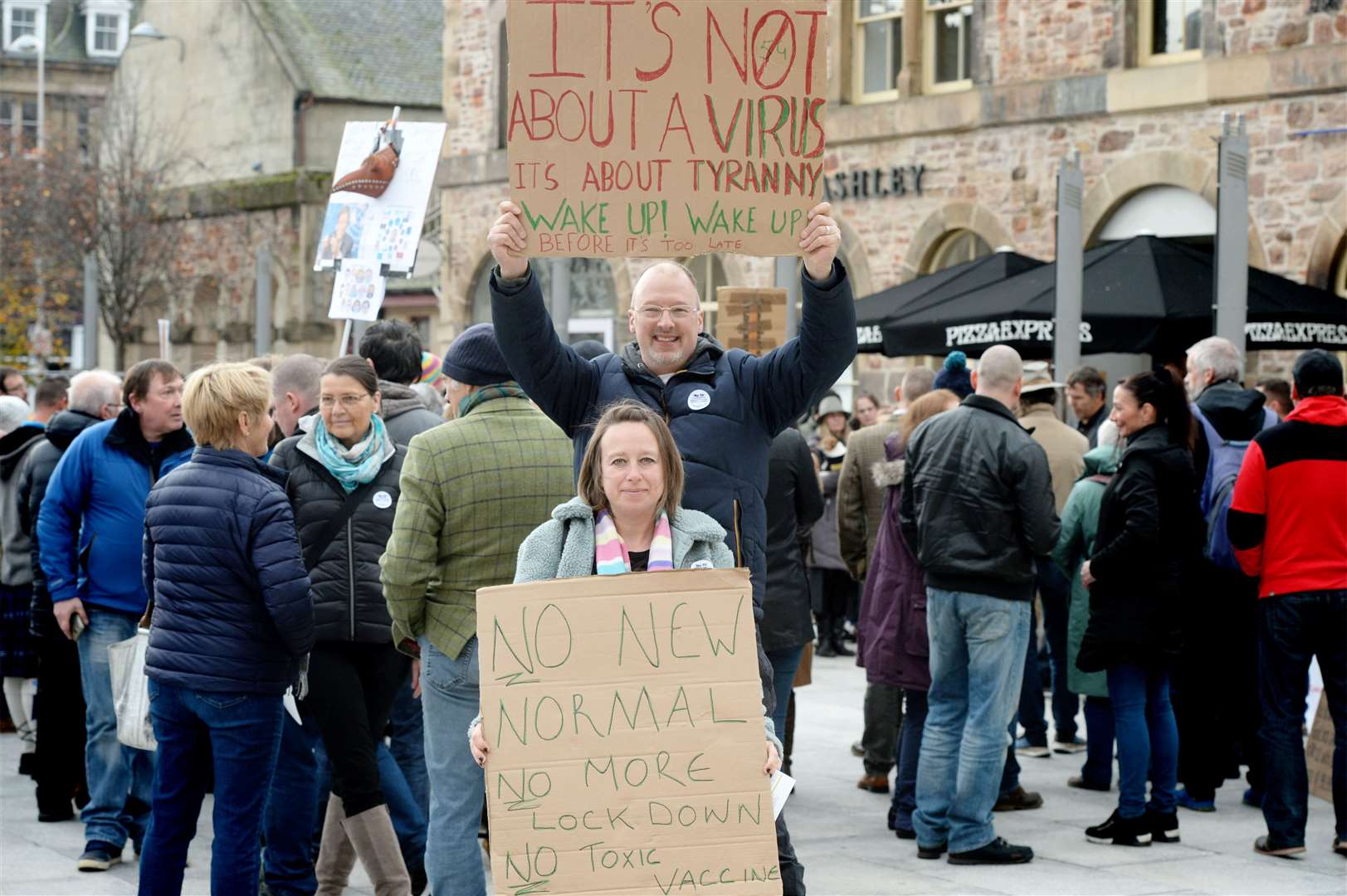 Mark and Lisa Huis were among people protesting against coronavirus restrictions.