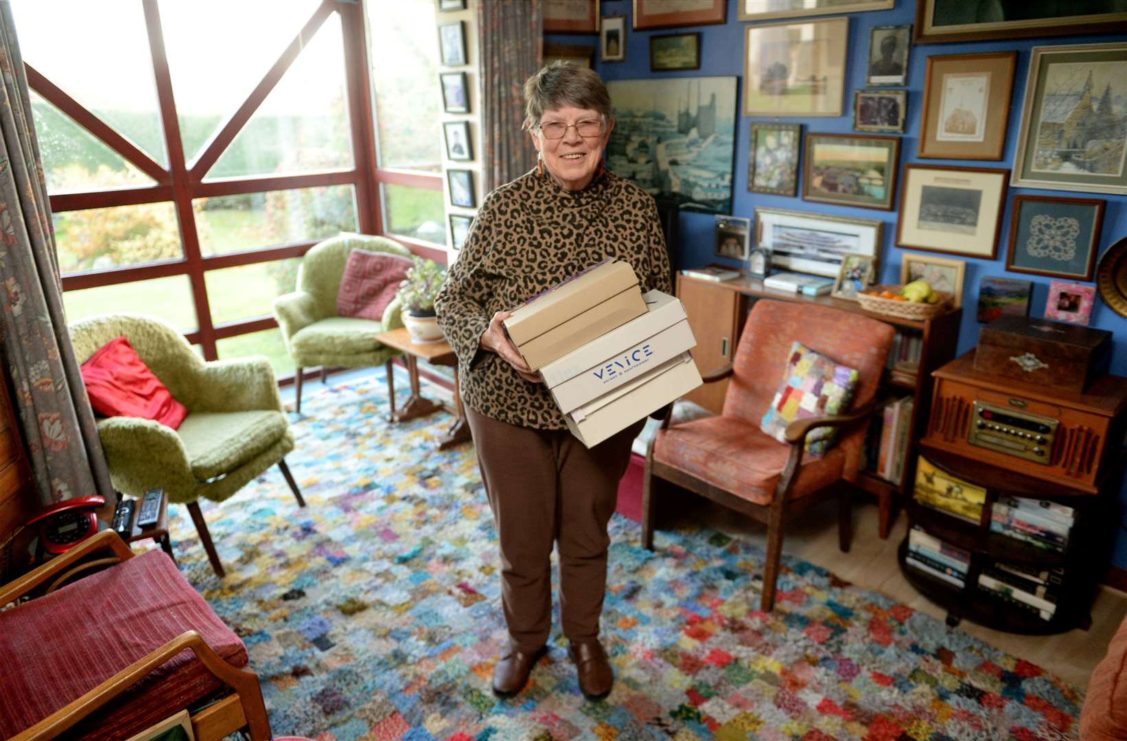 Ethel Urquhart (78) has been making up boxes for Blythswood, and this year she made 355 boxes..Etherl Urquhart holding a few of the boxes that she's already started for next year..Picture: James Mackenzie..