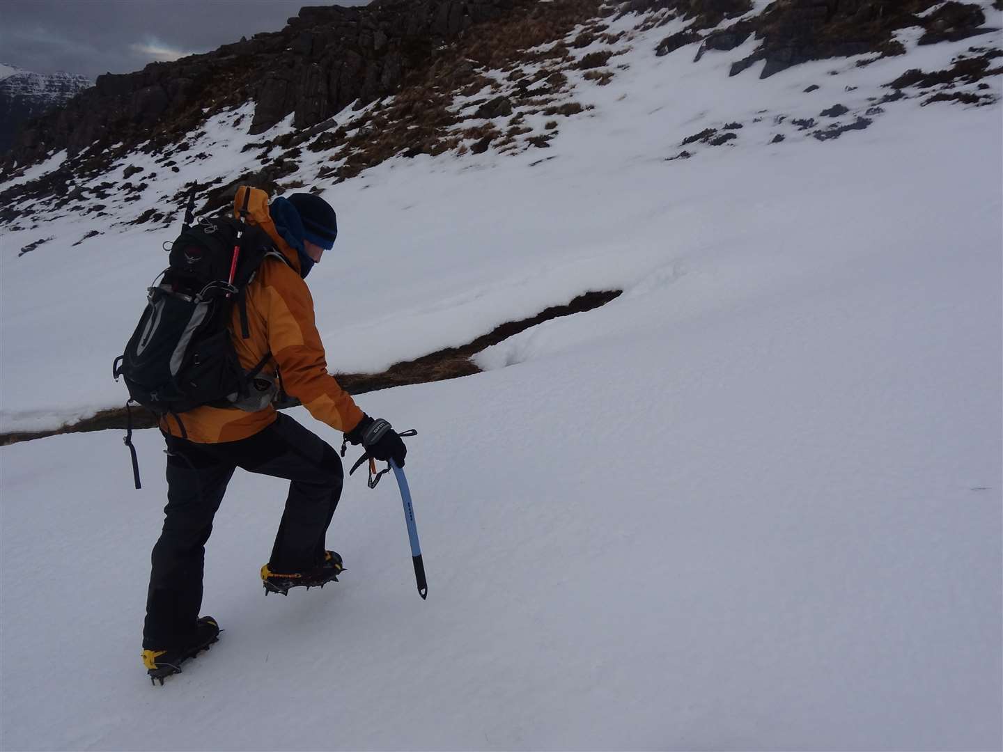 Peter using his ice axe and crampons.
