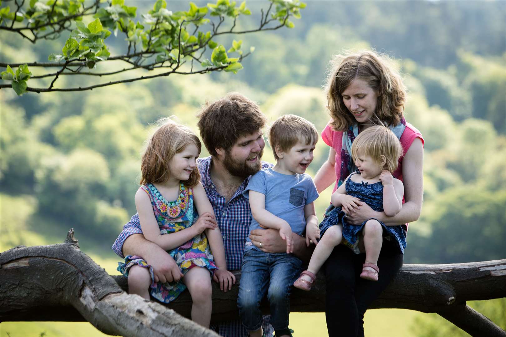 Zoe Powell from Chinnor, Oxfordshire, with her husband Josh and their three children Phoebe, eight, Simeon, six, Amelia, four (Sarah Mak Photography)