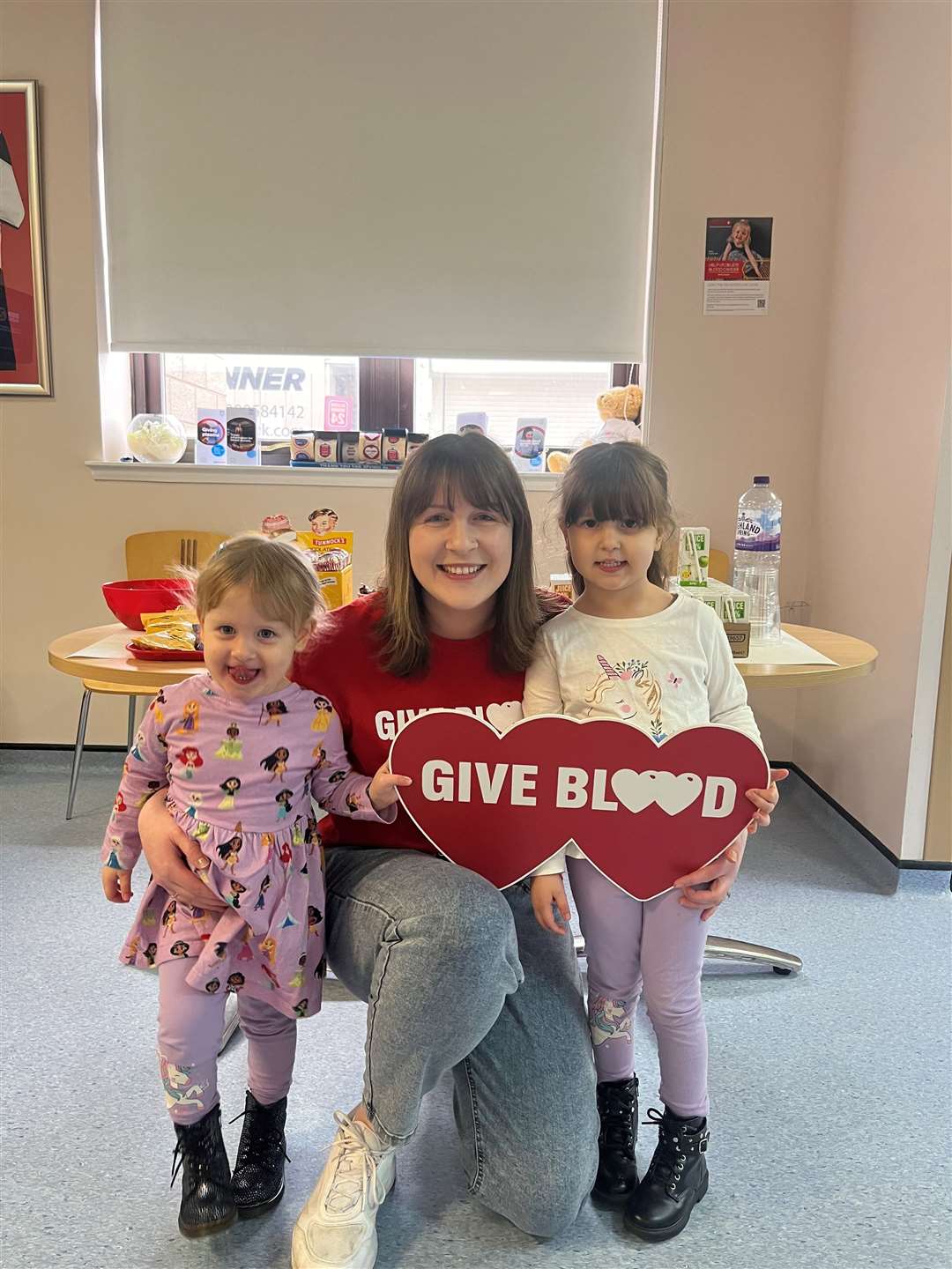 Kate Macrae and daughters Abigail and Hollie are grateful for the blood donor service that saved her life.