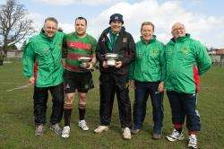 Bruce MacGreggor, Kevin Brown (captain), David Carson (head coach), Ray Dines and Alistair Wemyss with the trophies