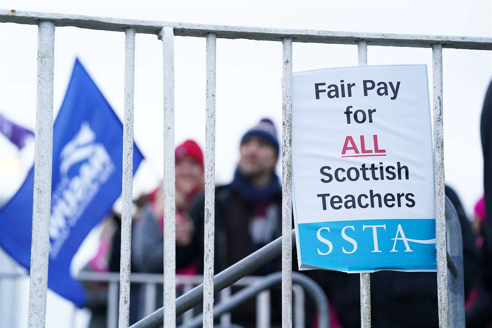 Members of the EIS and SSTA unions on the picket line at St Andrew’s and St Bride’s High School in South Lanarkshire (Andrew Milligan/PA)