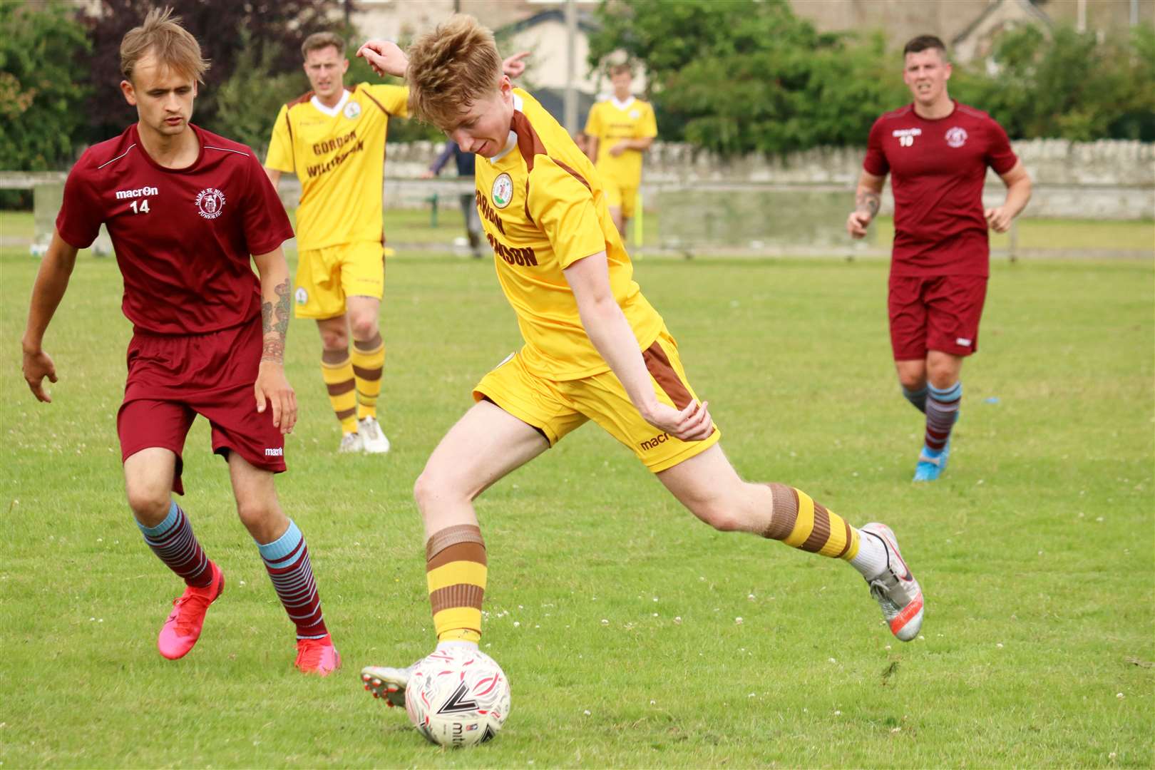Nairn St Ninian v Forres Mechanics 10 July 2021: Jordan Andrew trying to get the ball..Picture: James Mackenzie..
