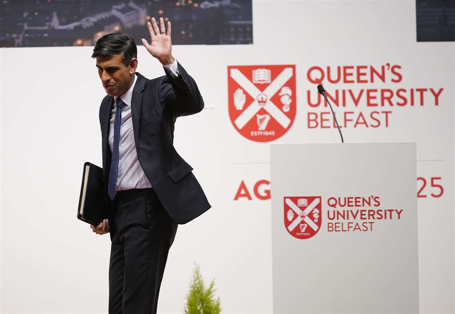 Prime Minister Rishi Sunak leaves the stage after addressing the conference (Niall Carson/PA)