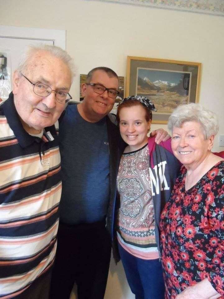 Tombo Tolmie, far left, son Derek, granddaughter Makayla and his late wife Heather.