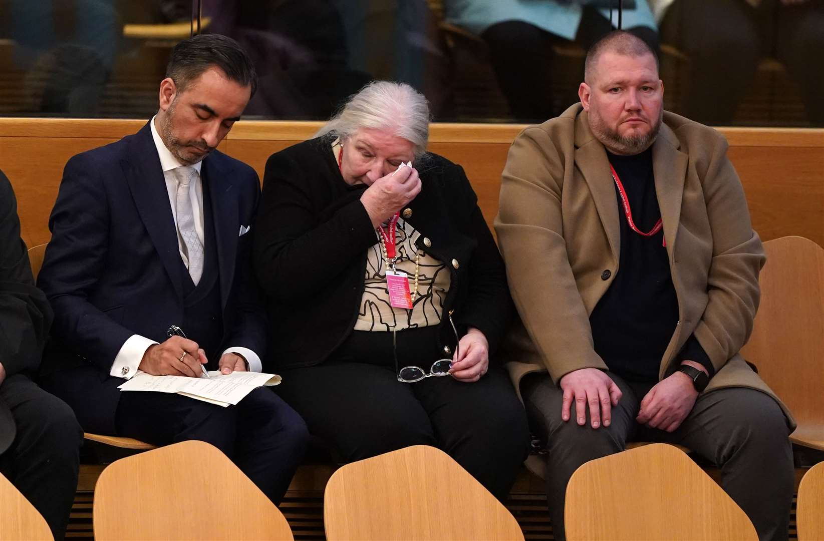 Margaret Caldwell wiped her eyes as she looked on at Holyrood to hear the announcement of a public inquiry into her daughter’s murder case (Andrew Milligan/PA)