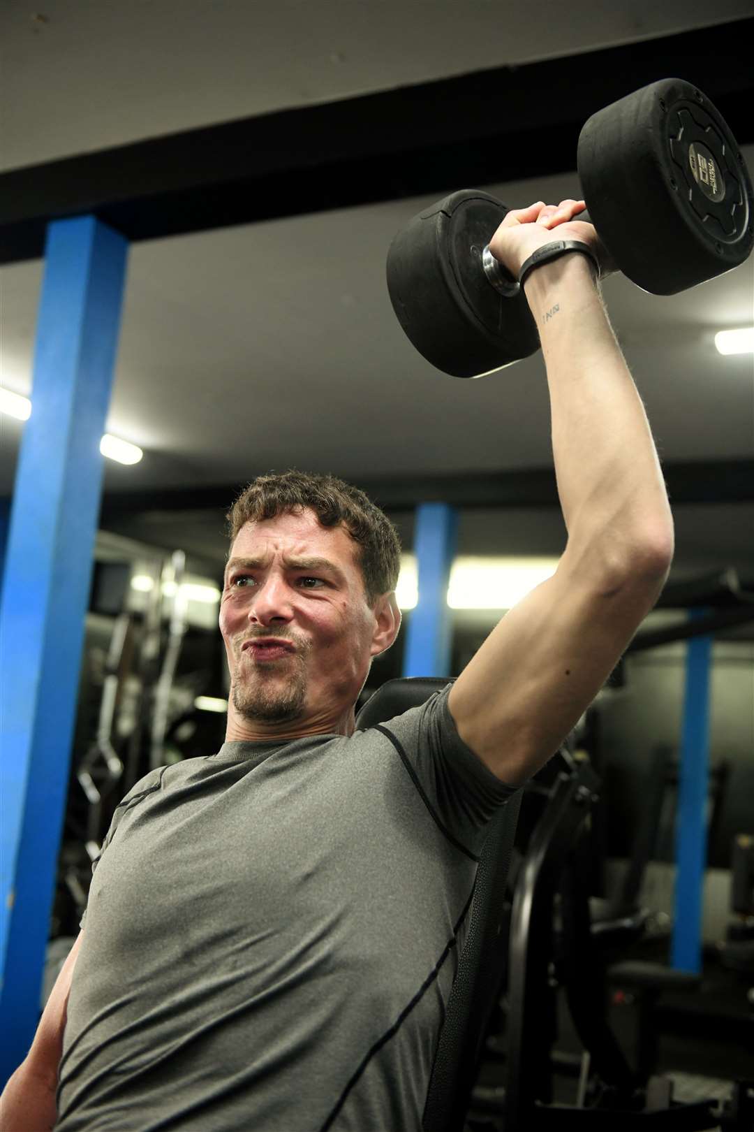 Matthew Green lifting dumbbells at Forge Gym Picture: James Mackenzie
