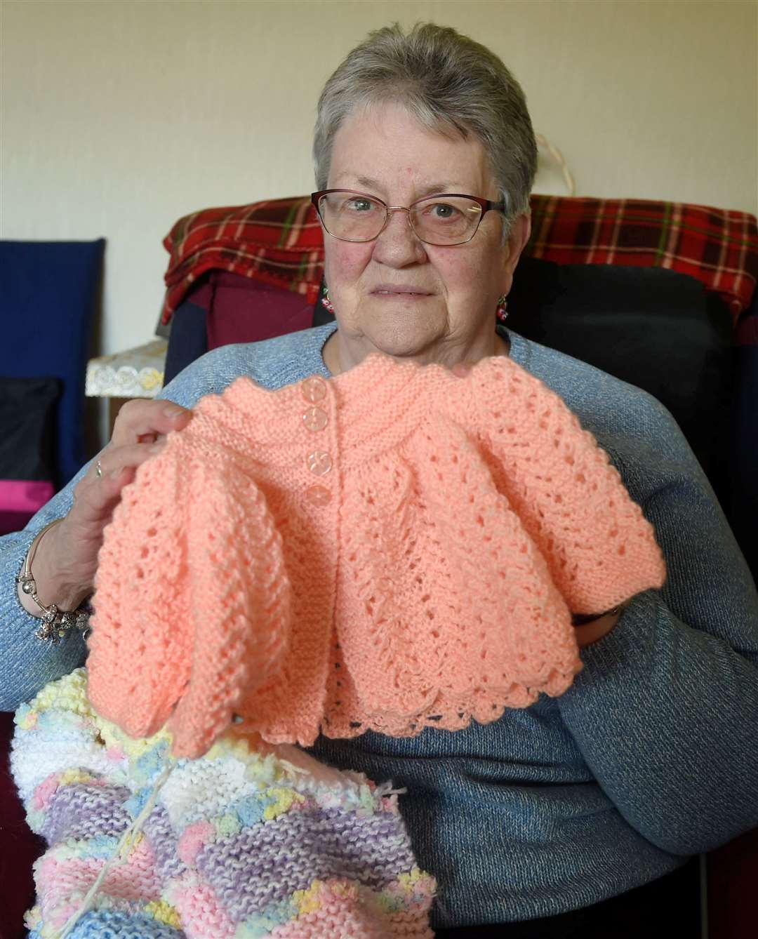 Marie MacIver knits clothing for premature babies.