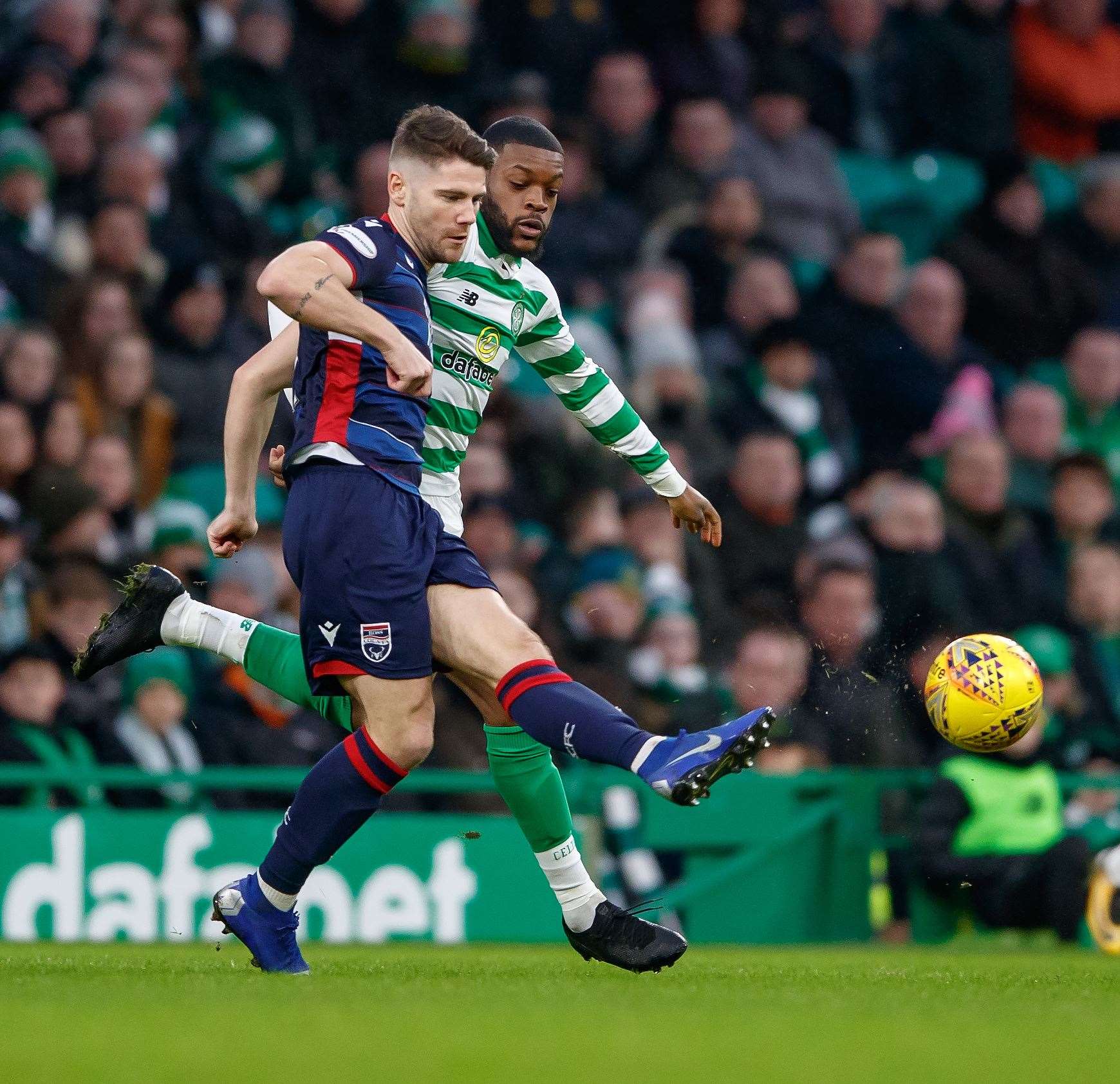 Picture - Ken Macpherson, Inverness. Celtic(3) v Ross County(0). 26.01.20. Ross County's Iain Vigurs clears from Celtic's Olivier Ntcham.