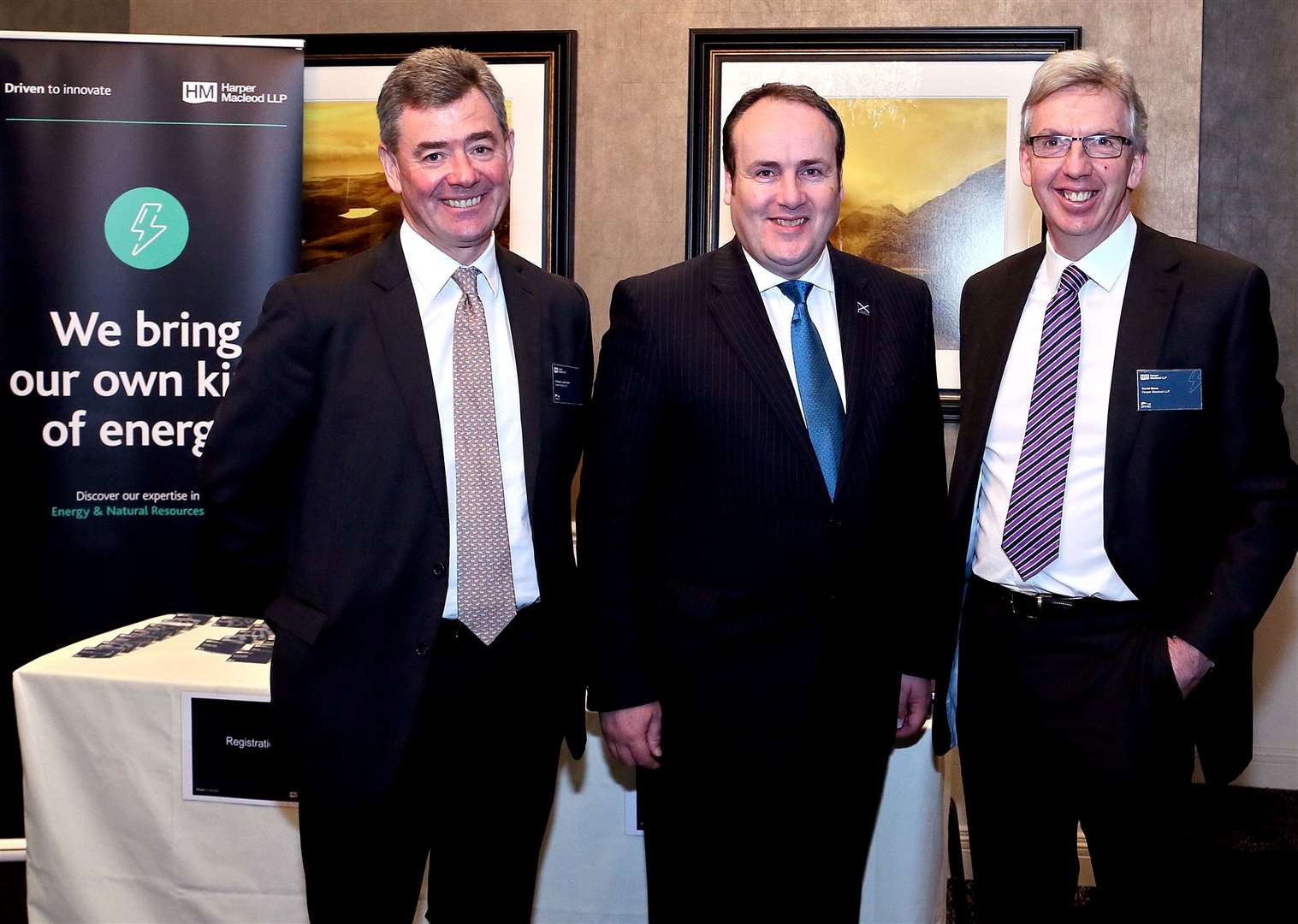 Scotland’s energy minister Paul Wheelhouse (centre) joins Harper Macleod’s Lorne Crerar and David Bone.
