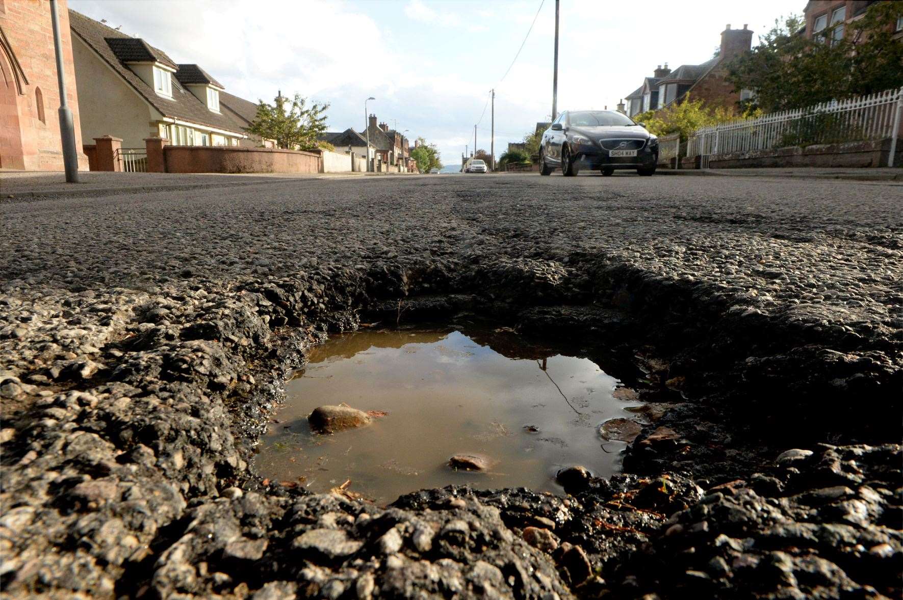 A pothole on a Highland road.
